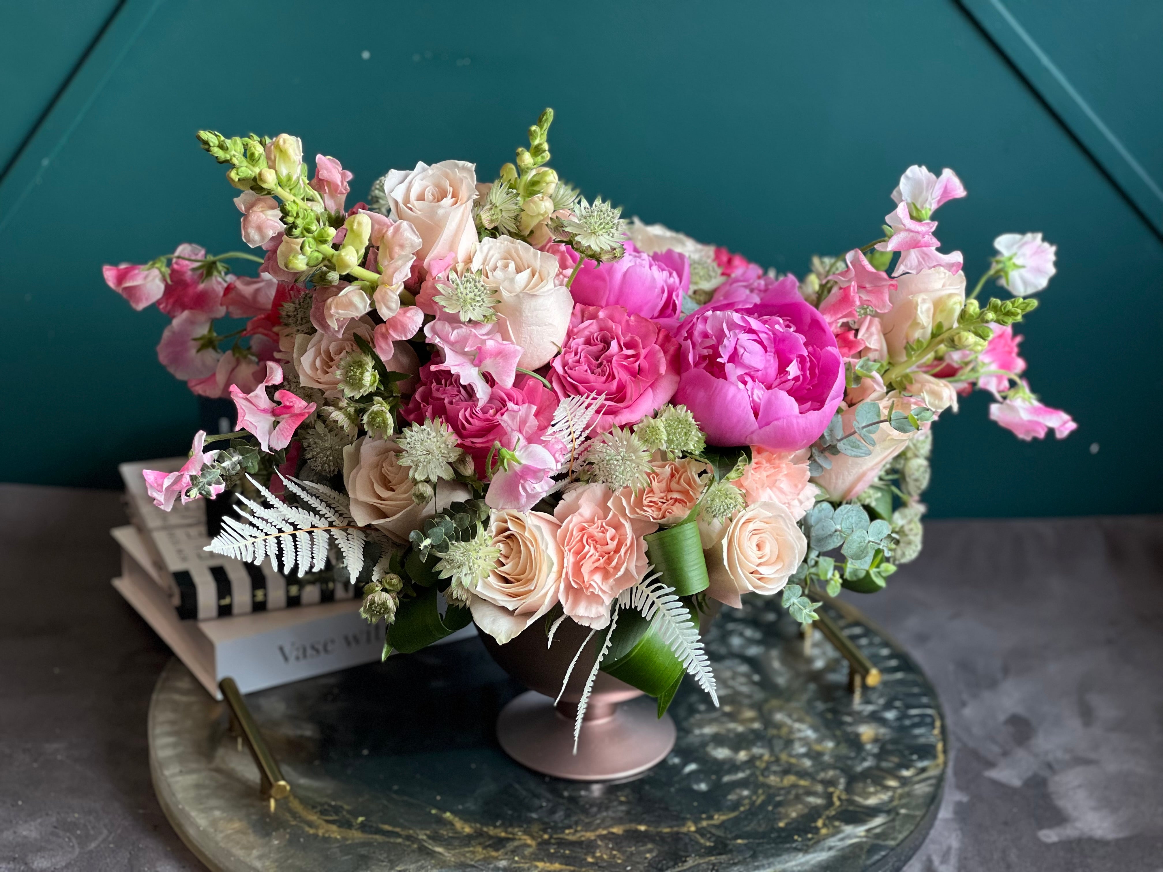 Designer peony arrangement in modern vase
