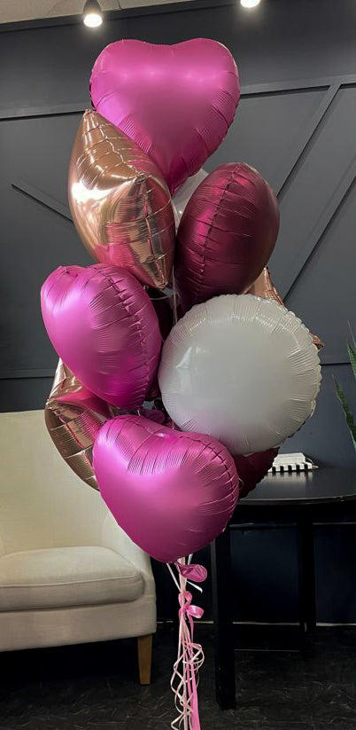 Dozen assorted balloons arranged by Luxury Flowers Miami