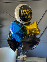 Dozen black gold and royal blue balloon bouquet for celebration delivery by Luxury Flowers Miami