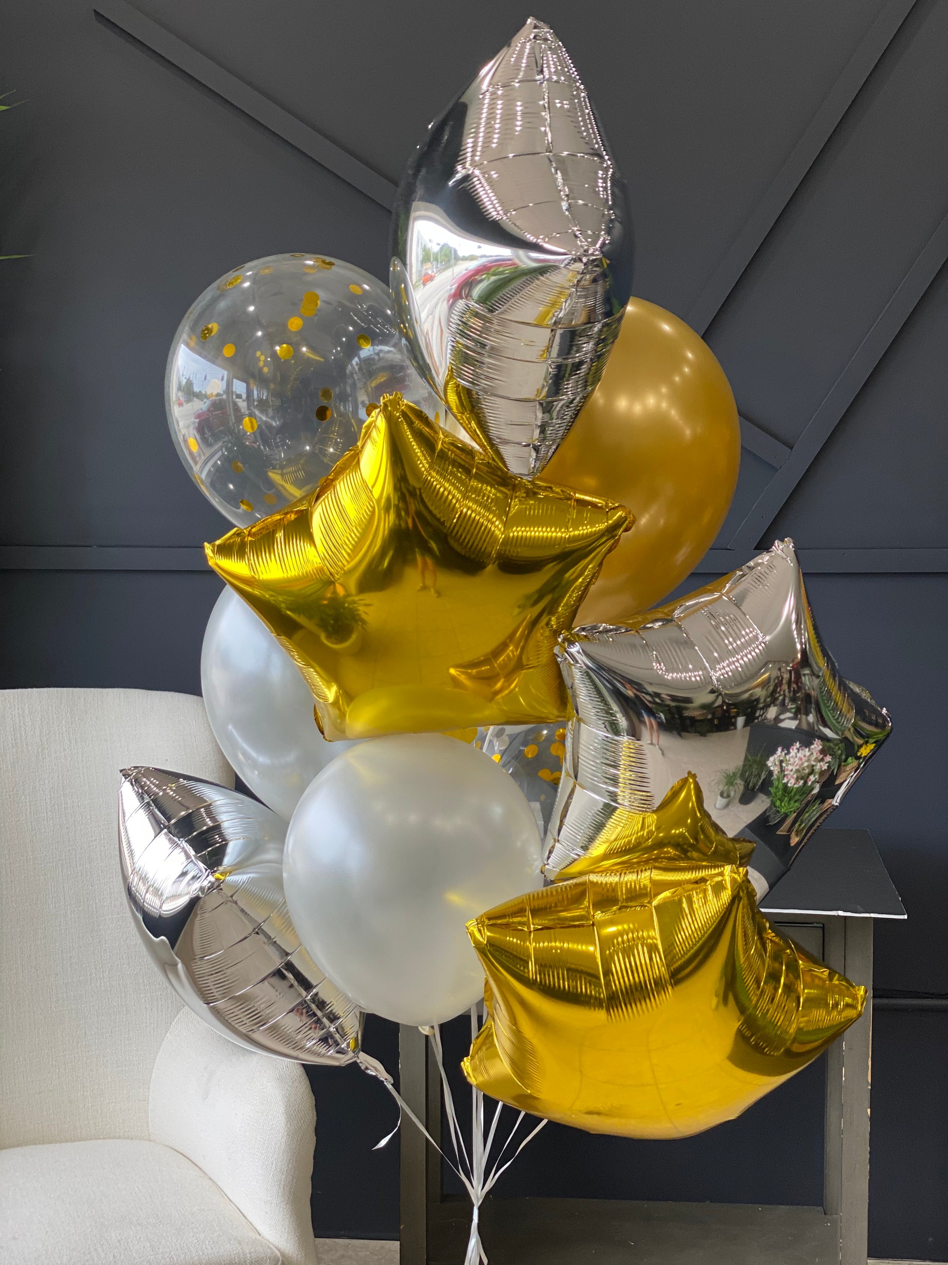 Dozen gold silver and ivory balloon bouquet for delivery in Miami