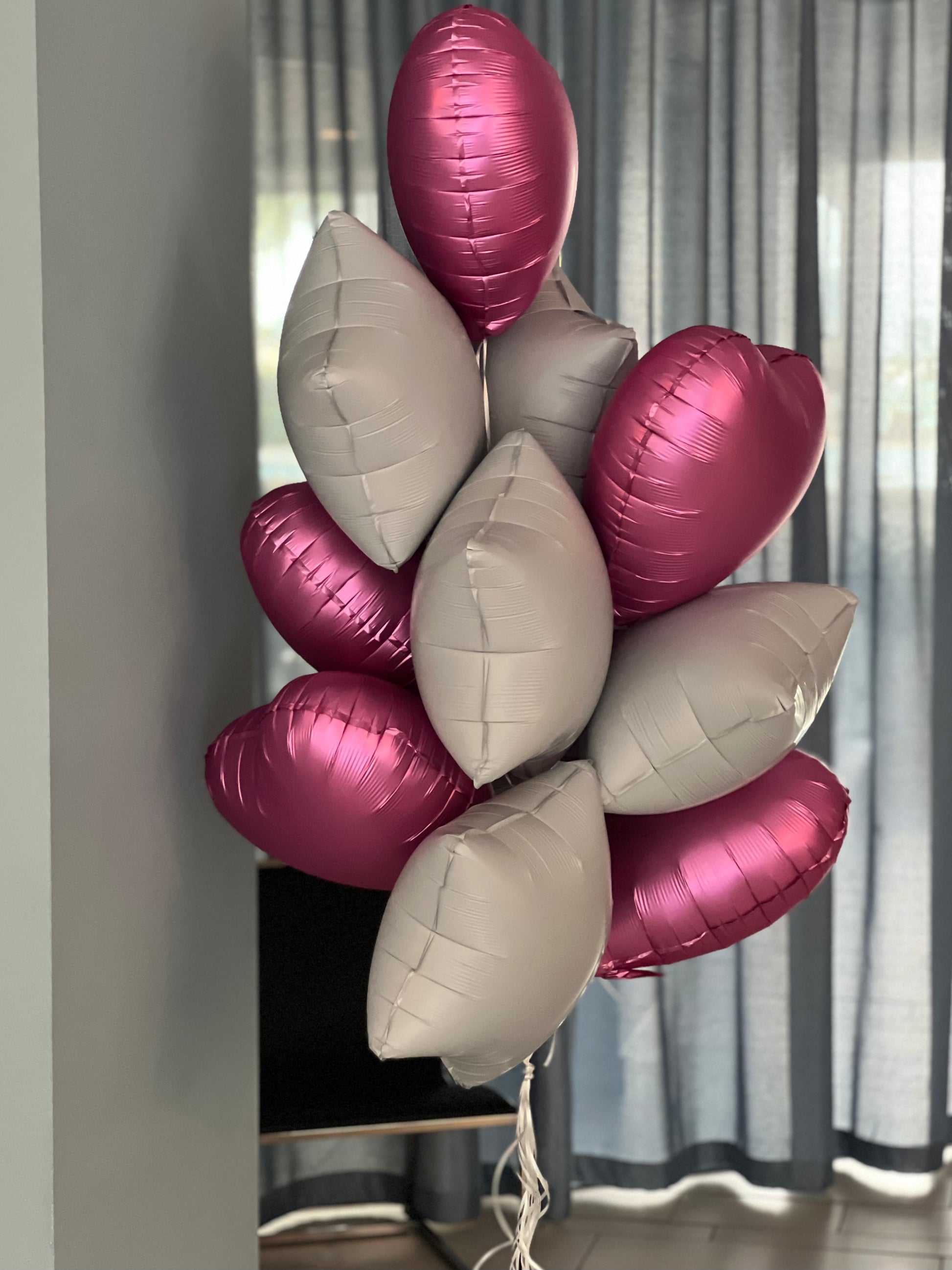 Dozen pink and white balloon bouquet for celebration delivery by Luxury Flowers Miami