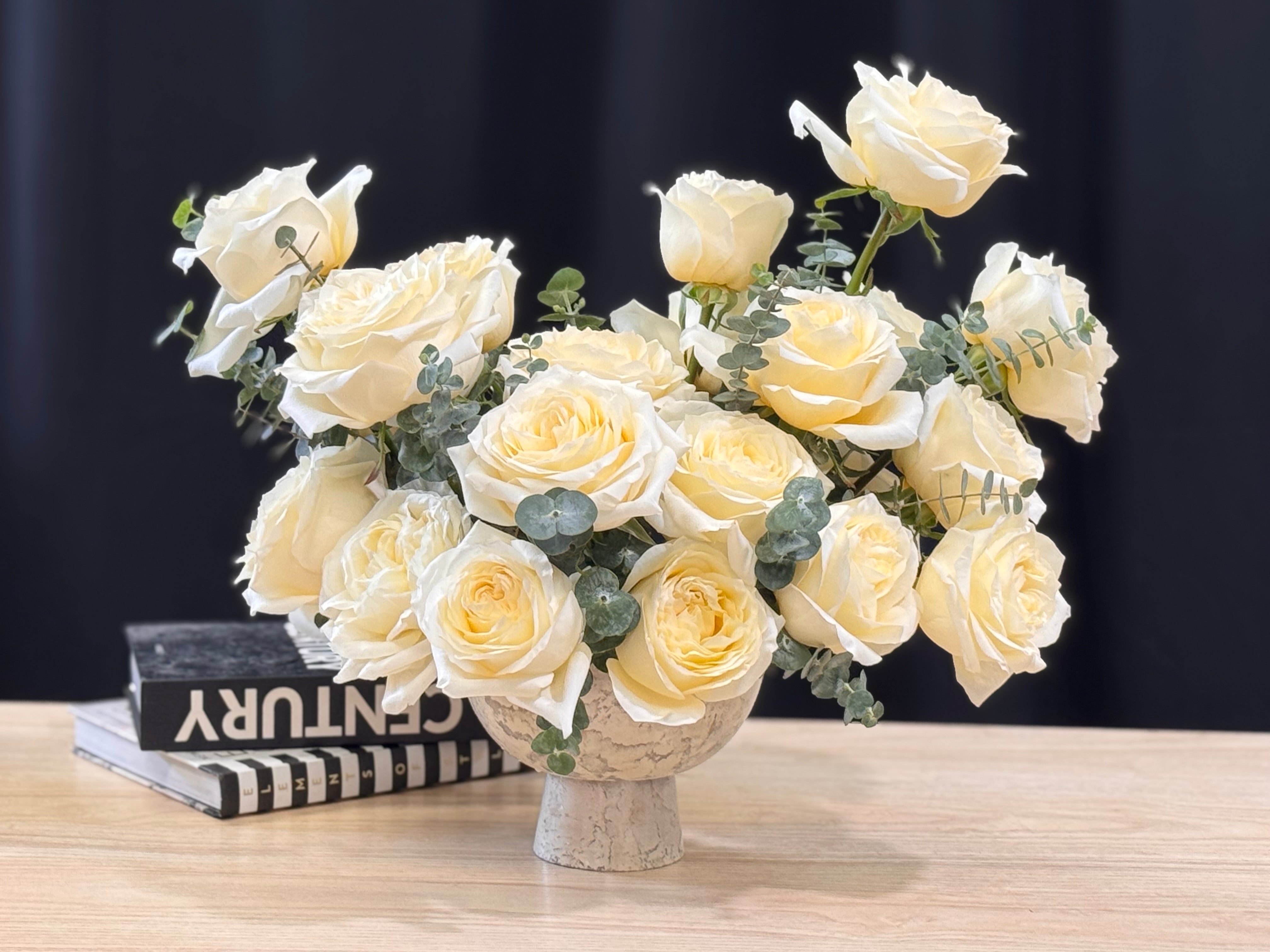 Elegant 24 white rose arrangement for delivery Miami