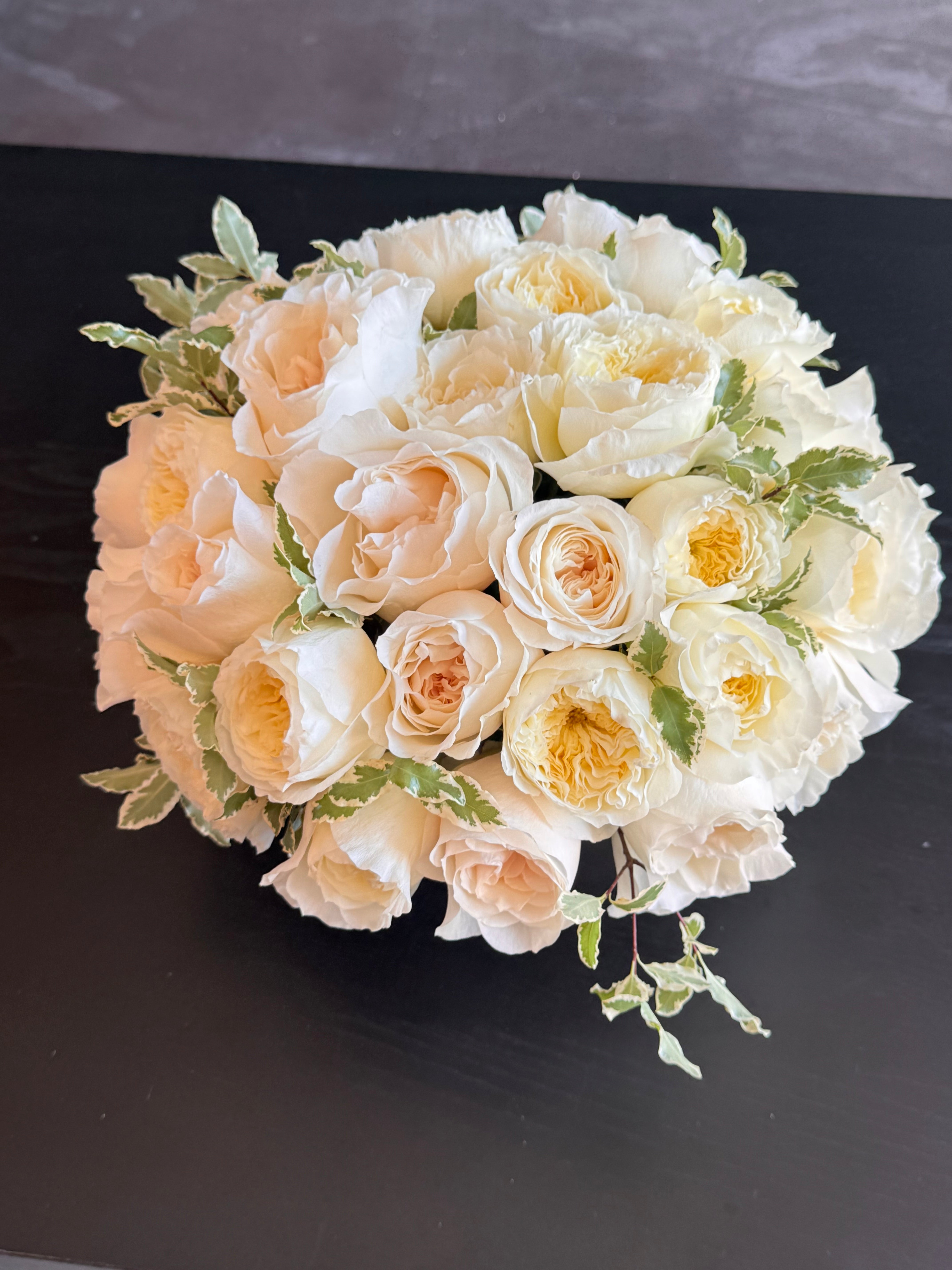 Elegant 36 garden roses arrangement in soft cream and blush tones