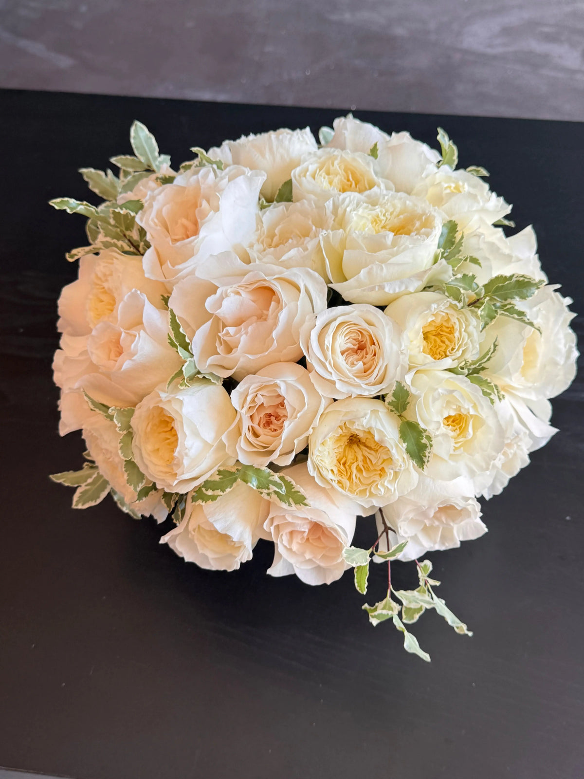 Elegant 36 garden roses arrangement in soft cream and blush tones
