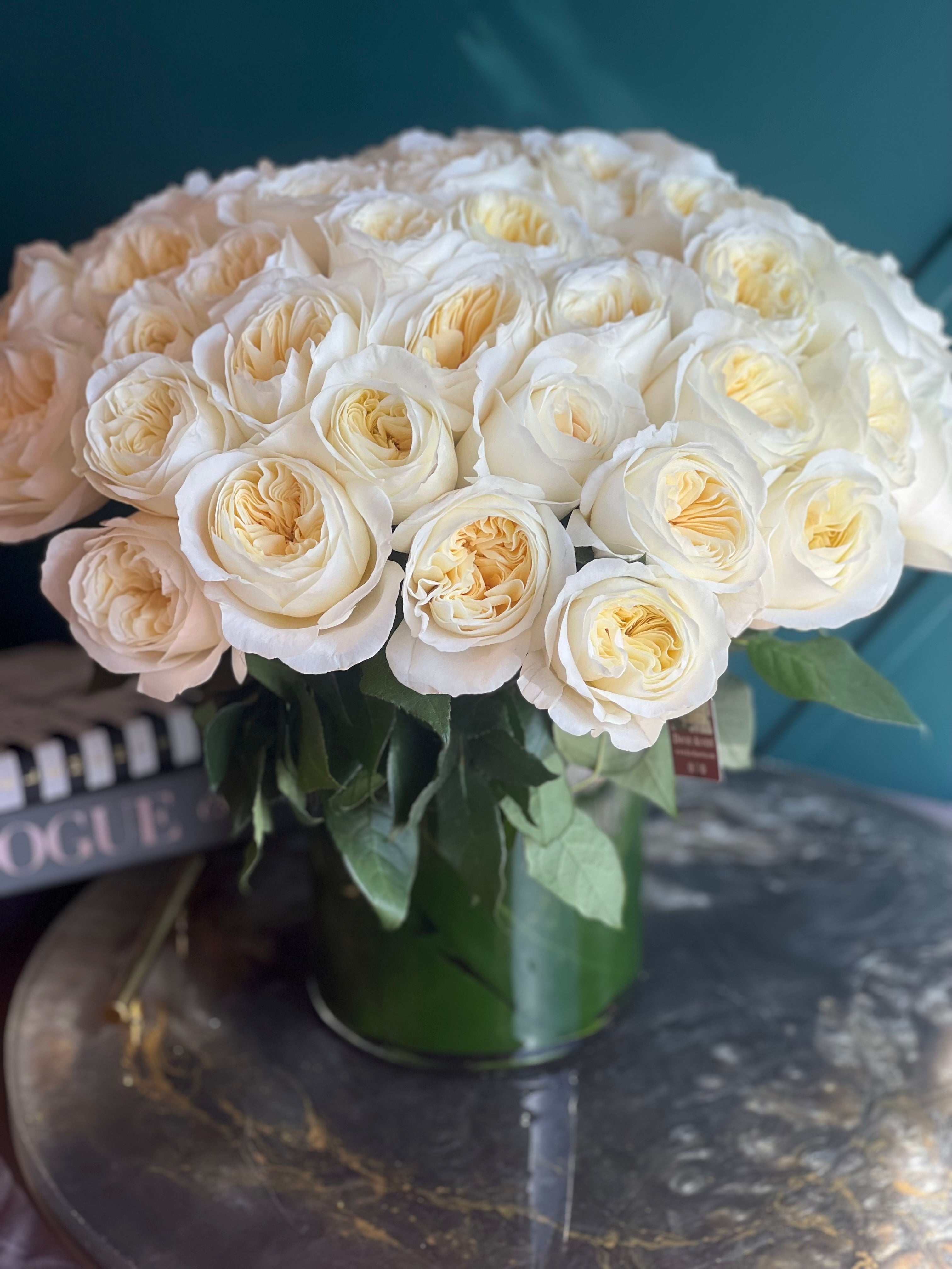 Elegant 50 garden roses arrangement for bridal showers and proposals