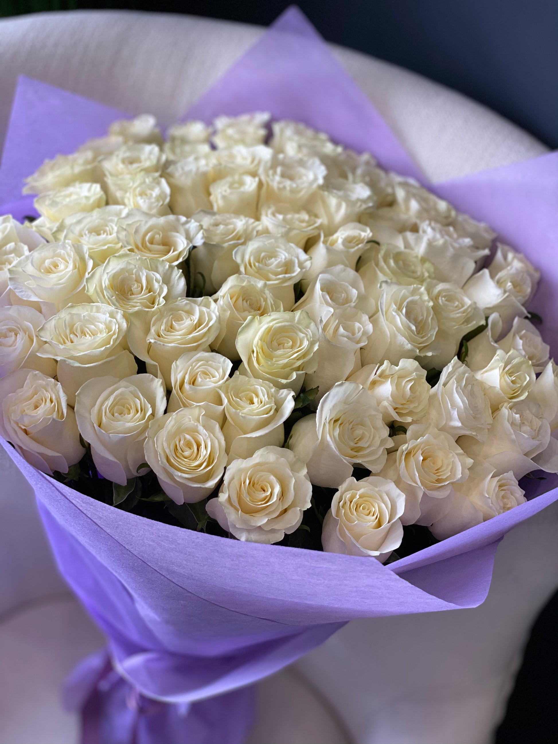 Elegant 75 white roses hand-tied bouquet