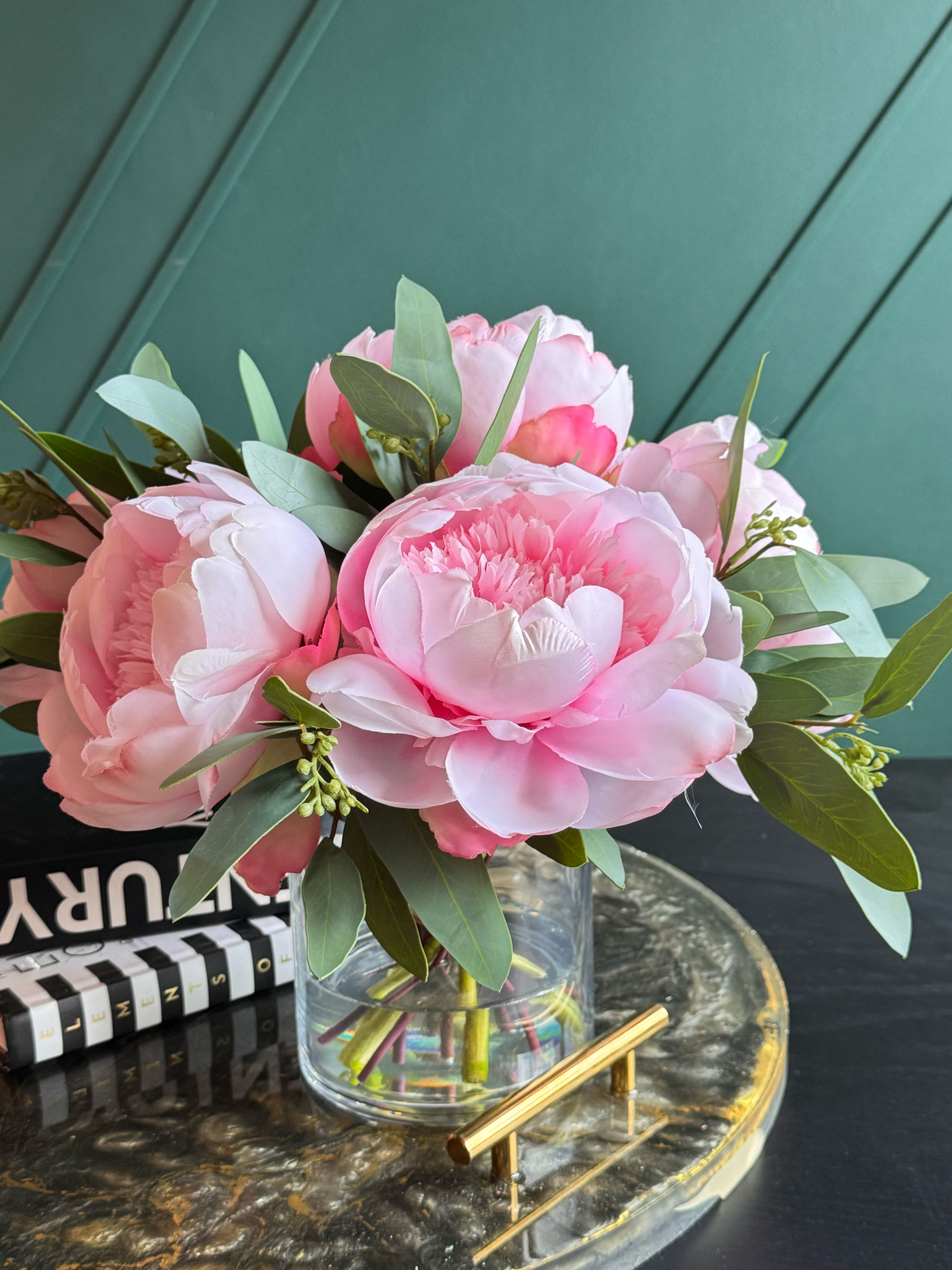 Elegant Real Touch peony arrangement featuring blush pink blooms and natural greenery.