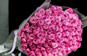 Elegant deep purple rose bouquet for same-day Miami delivery