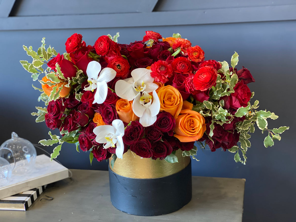 Elegant fall flower box in red orange burgundy and white