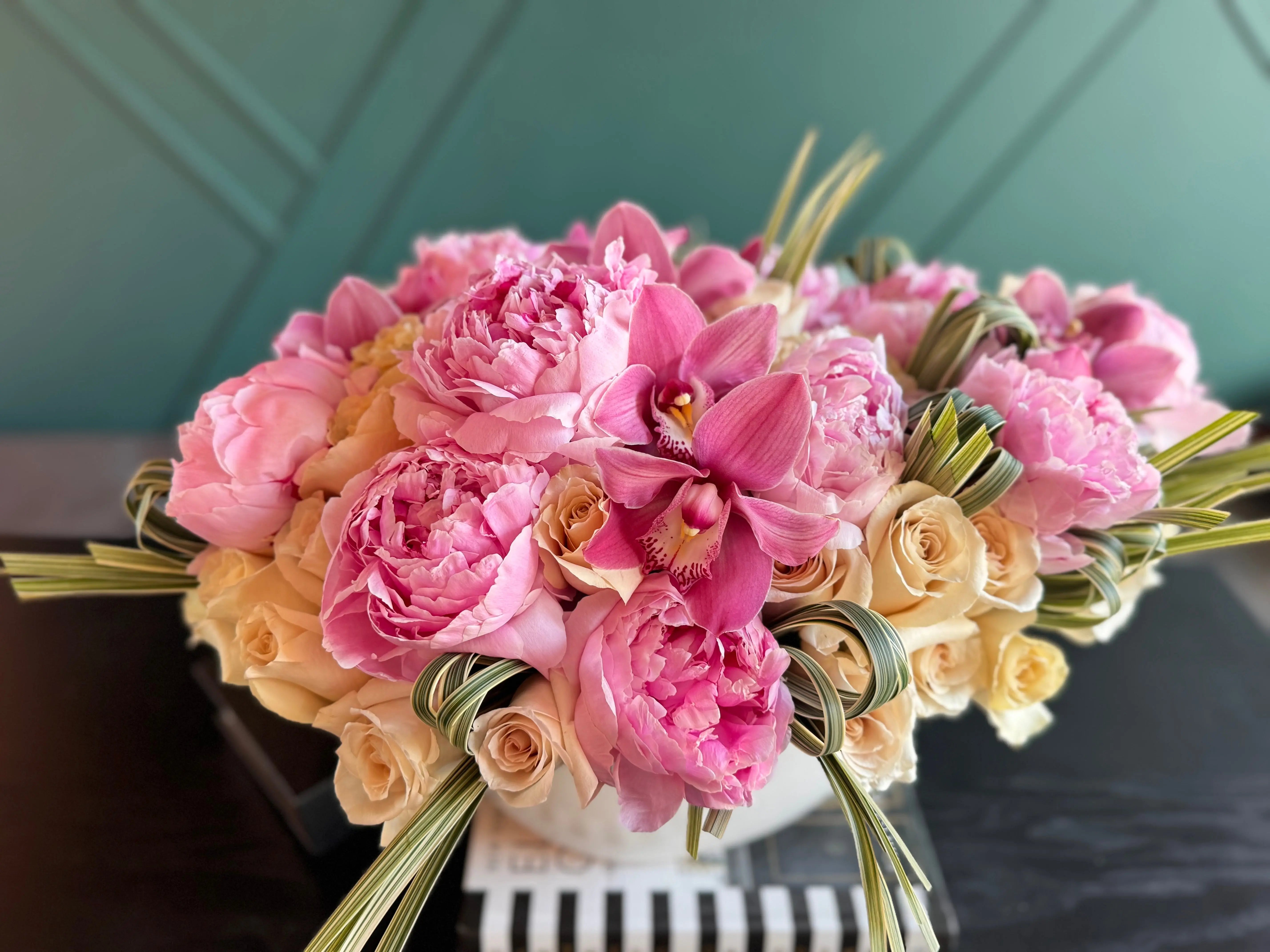 Elegant flower arrangement in ceramic vase for birthdays and anniversaries