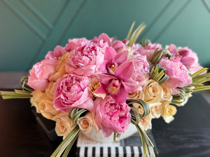 Elegant flower arrangement in ceramic vase for birthdays and anniversaries