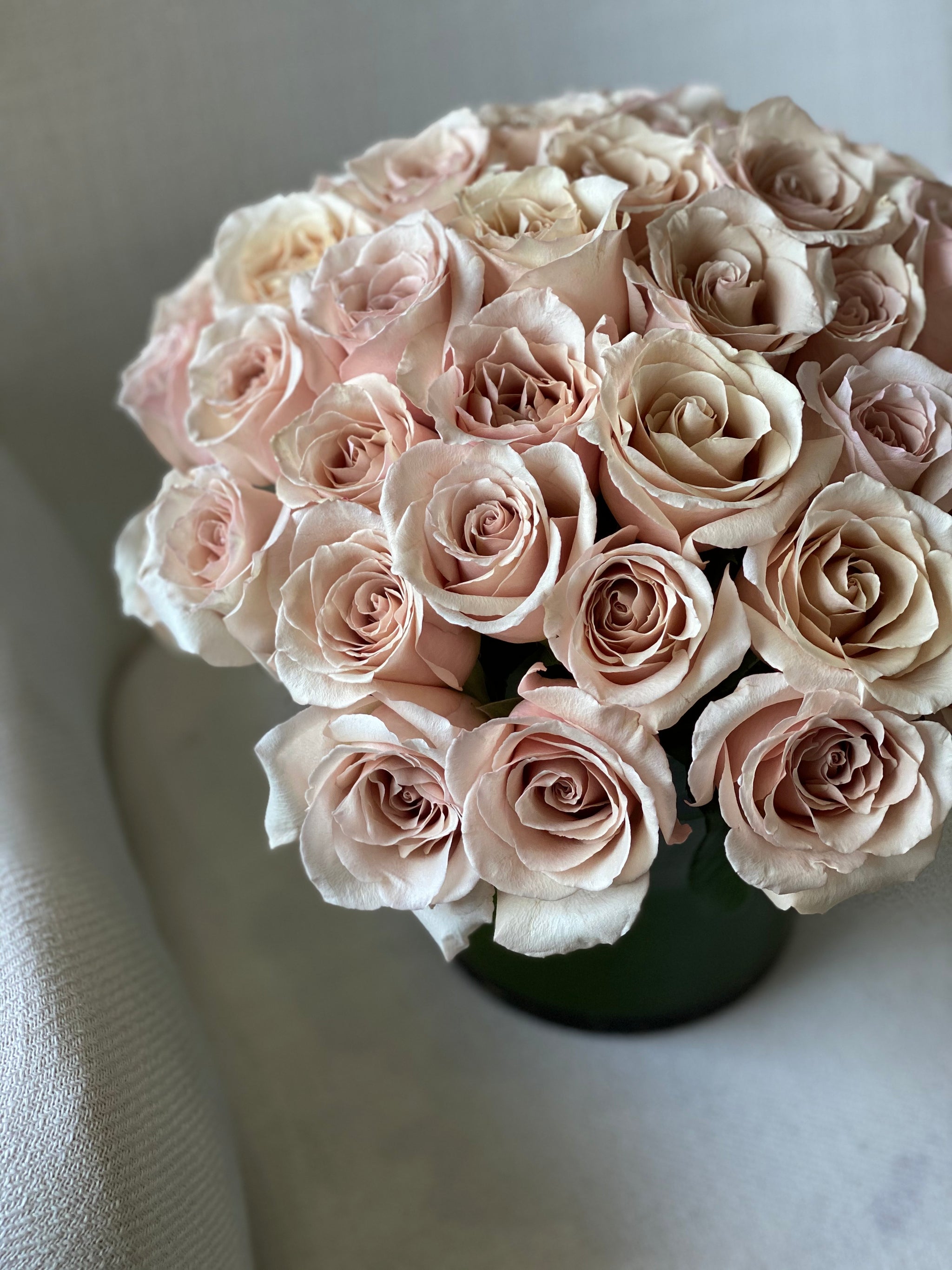 Elegant neutral rose arrangement with 24 cappuccino roses