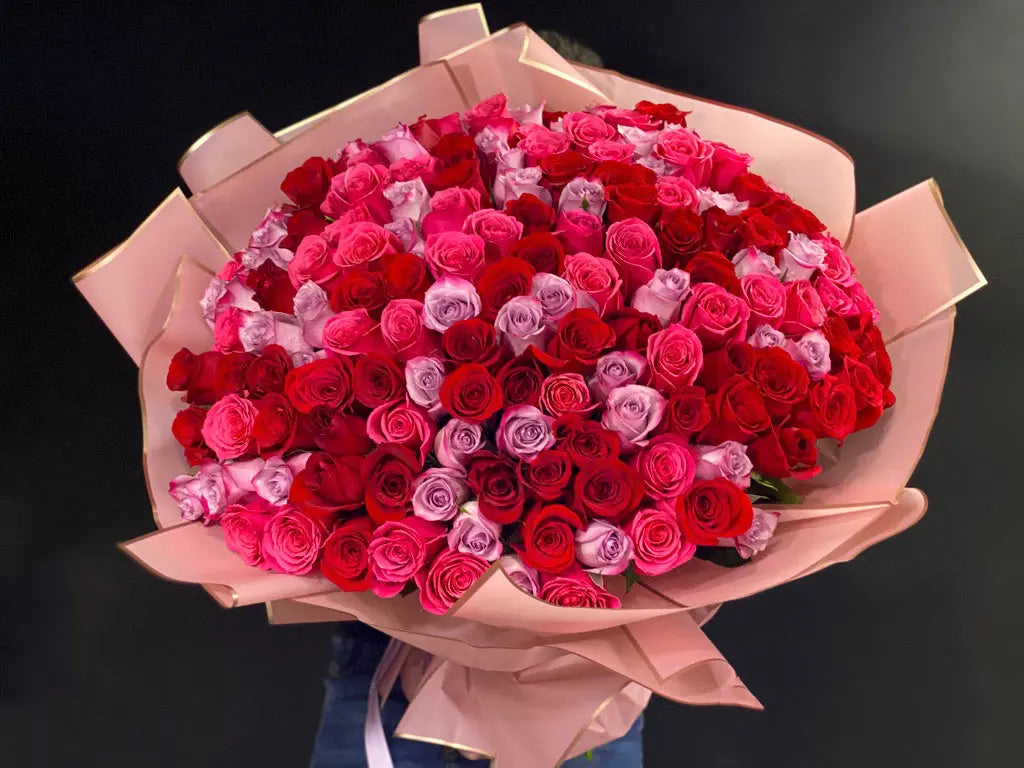 Elegant romantic bouquet 150 roses in mixed colors wrapped in premium paper