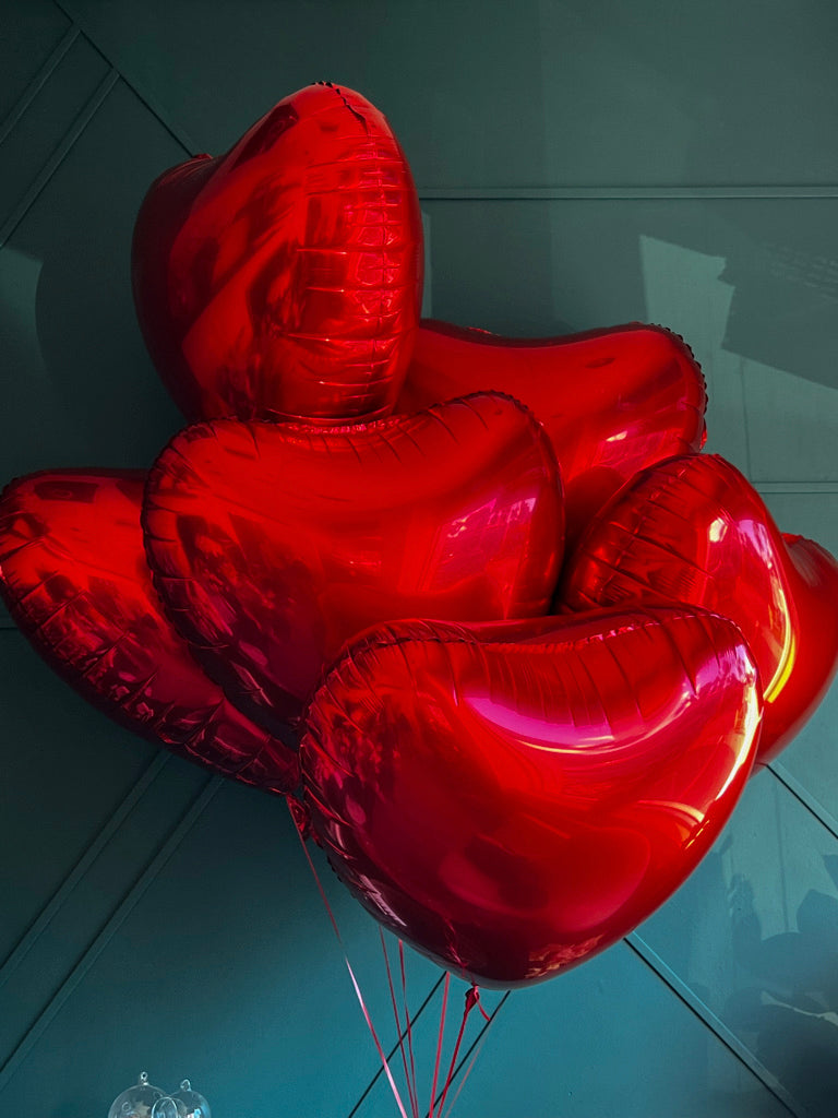 Extra large red heart balloon bouquet for romantic delivery by Luxury Flowers Miami