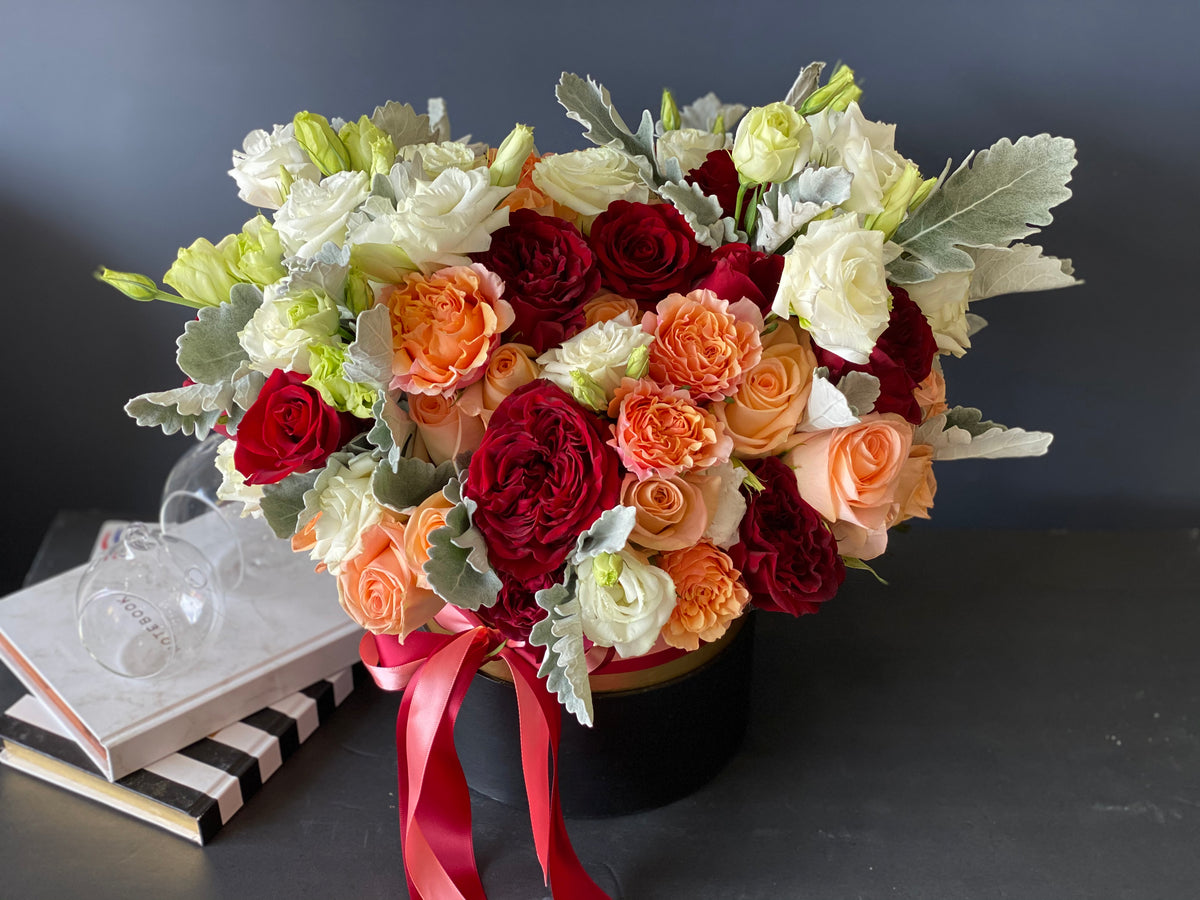 Fall flower arrangement with red and orange garden roses Miami