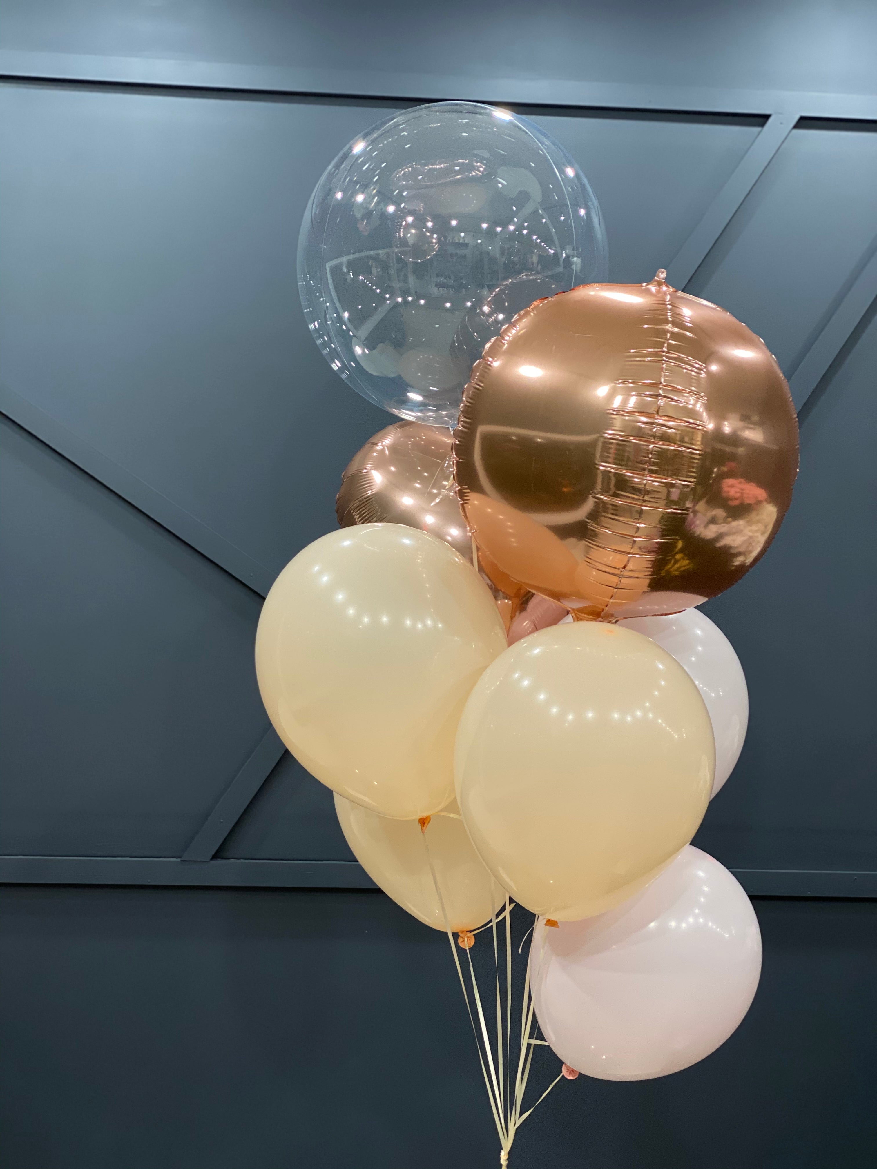 Foil and latex balloon bouquet with 2 extra large balloons on top by Luxury Flowers Miami

