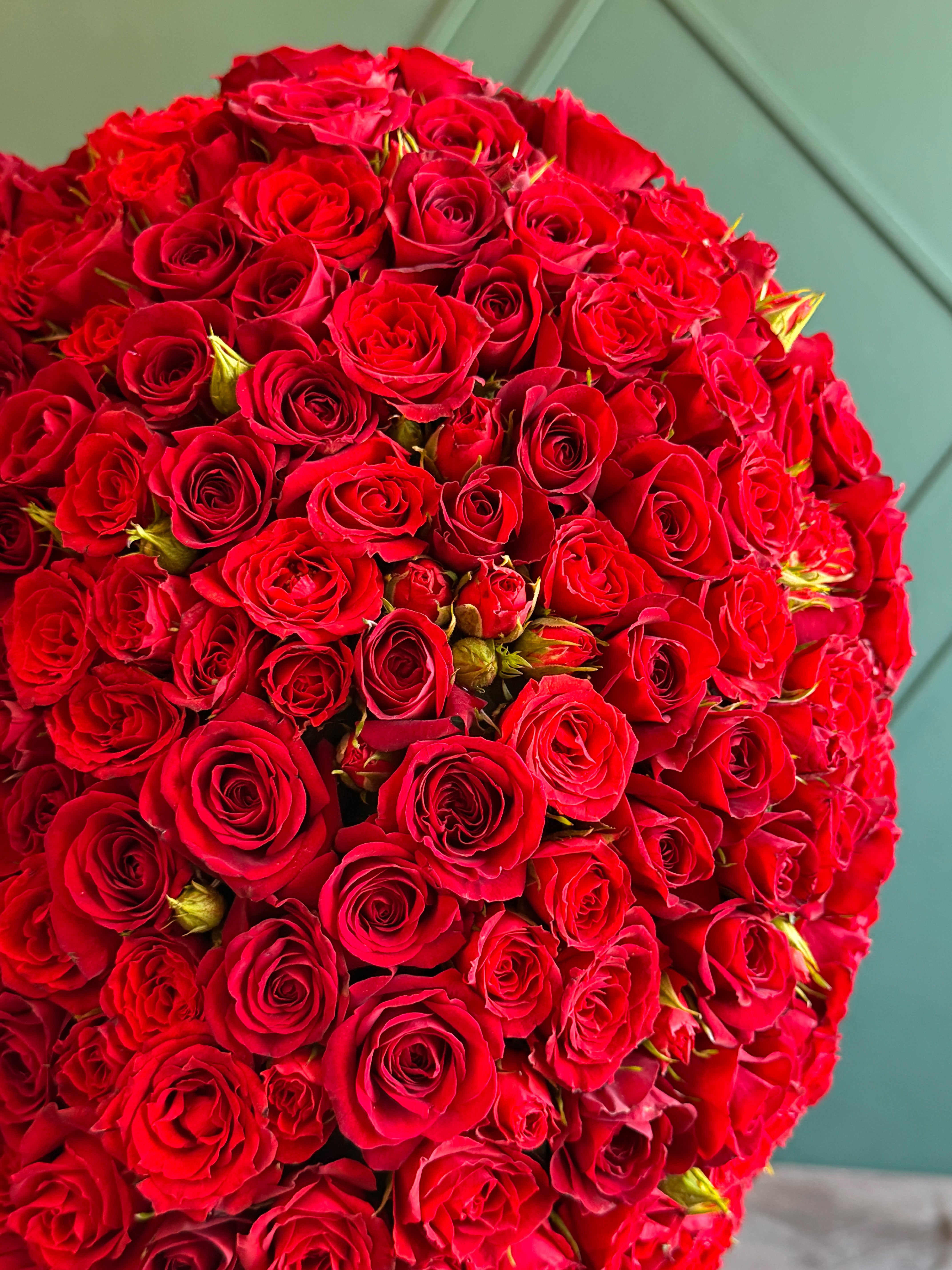 Fresh flower heart sculpture for engagement celebration