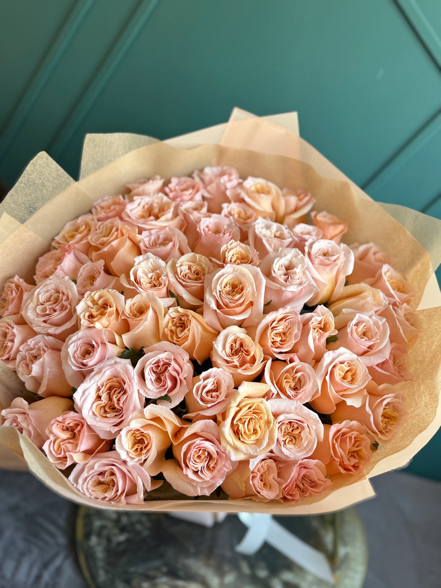 Fresh peach rose bouquet handcrafted by Luxury Flowers Miami