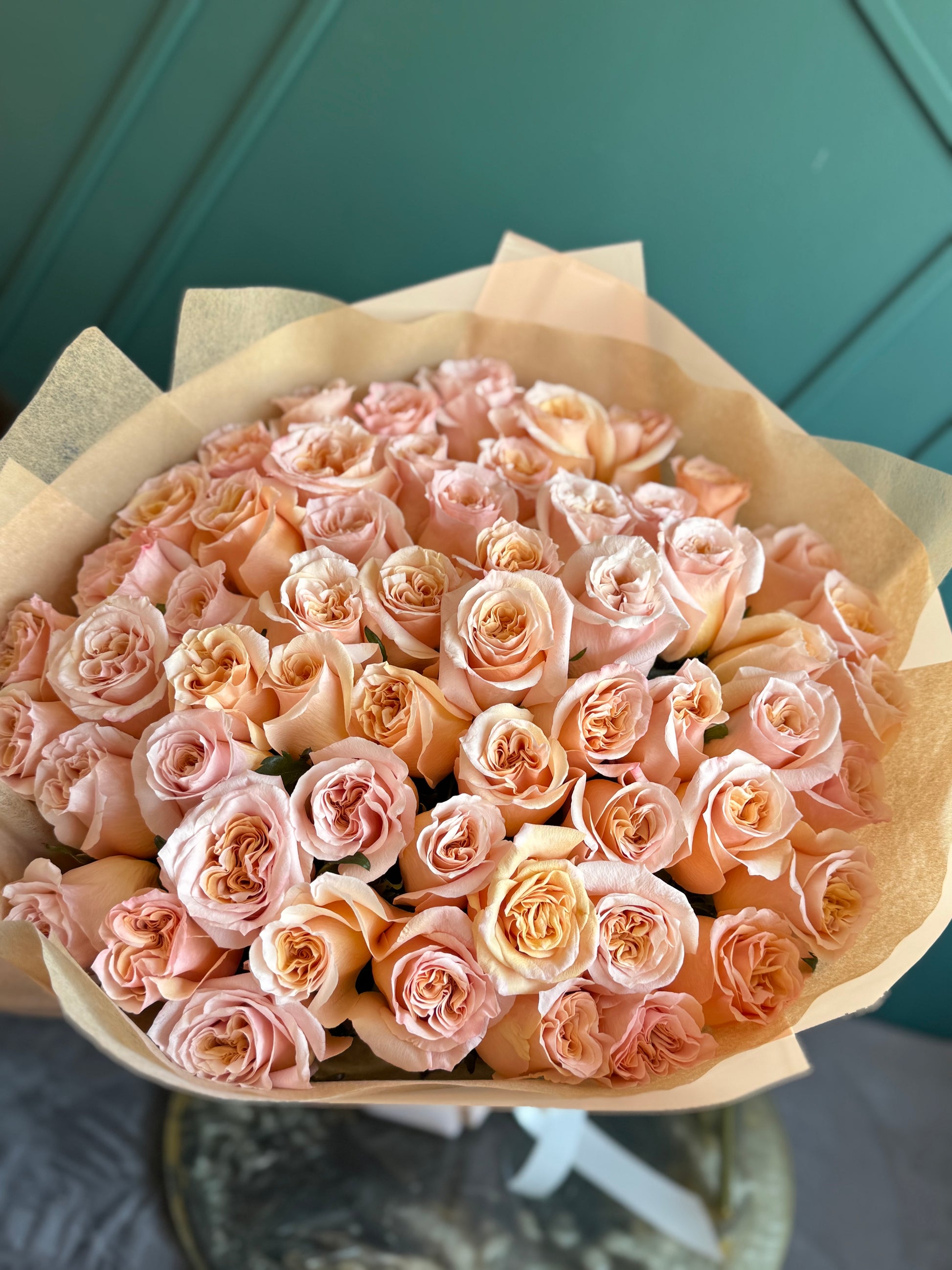 Fresh peach rose bouquet handcrafted by Luxury Flowers Miami