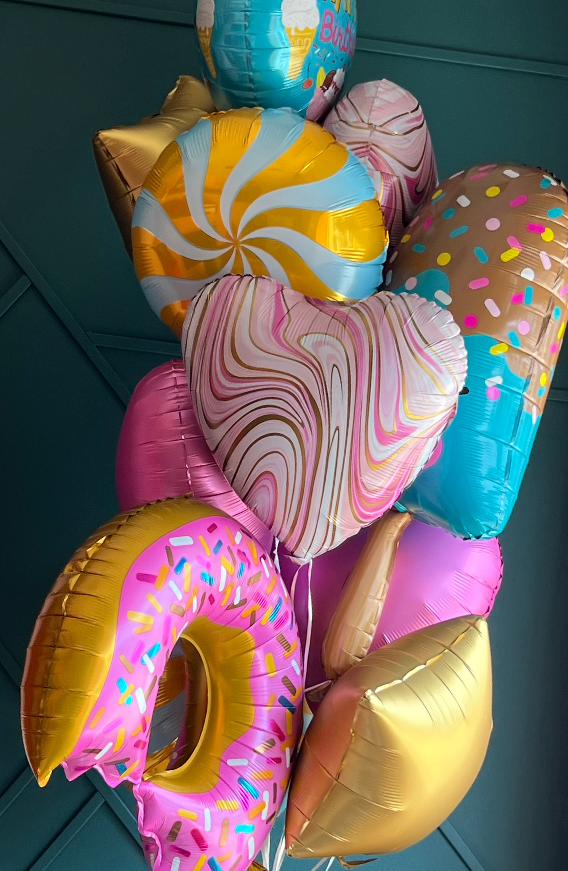 Fun birthday balloons with candy ice cream and star shapes
