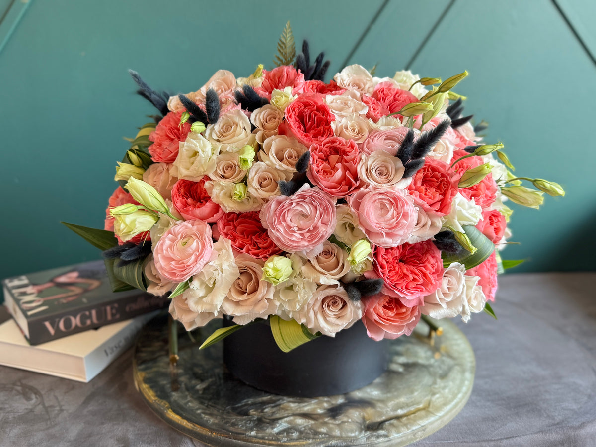 Garden rose arrangement in elegant black flower box