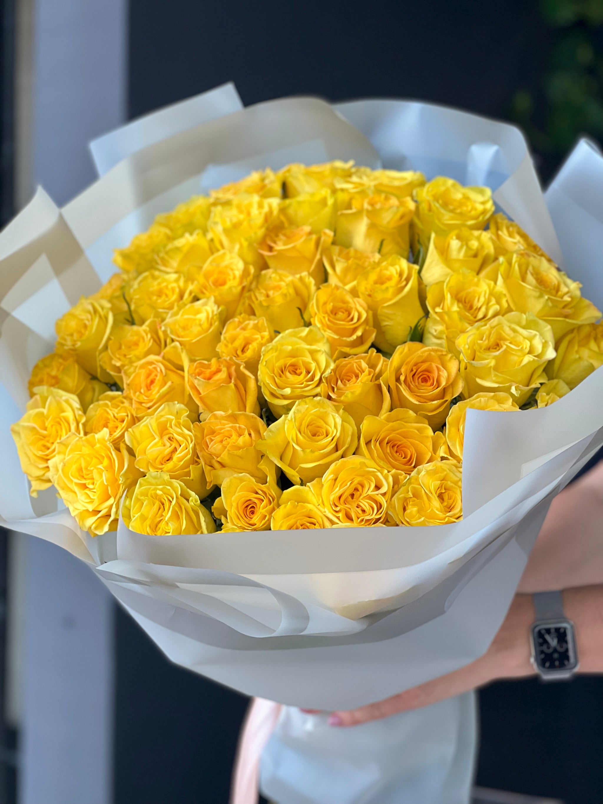 Golden yellow rose arrangement handcrafted by Luxury Flowers Miami