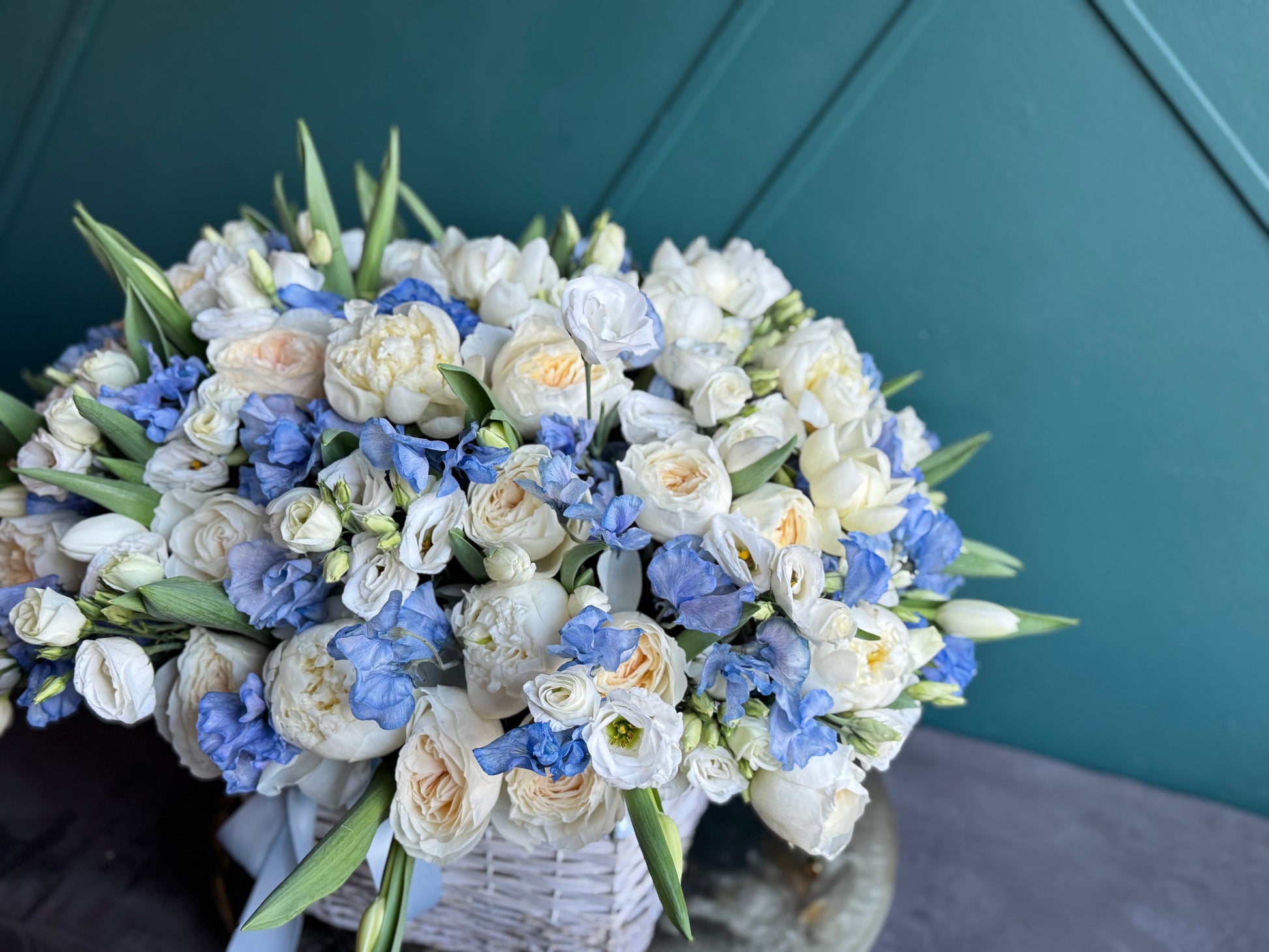 Grand luxury flower basket handcrafted with premium seasonal flowers in Miami
