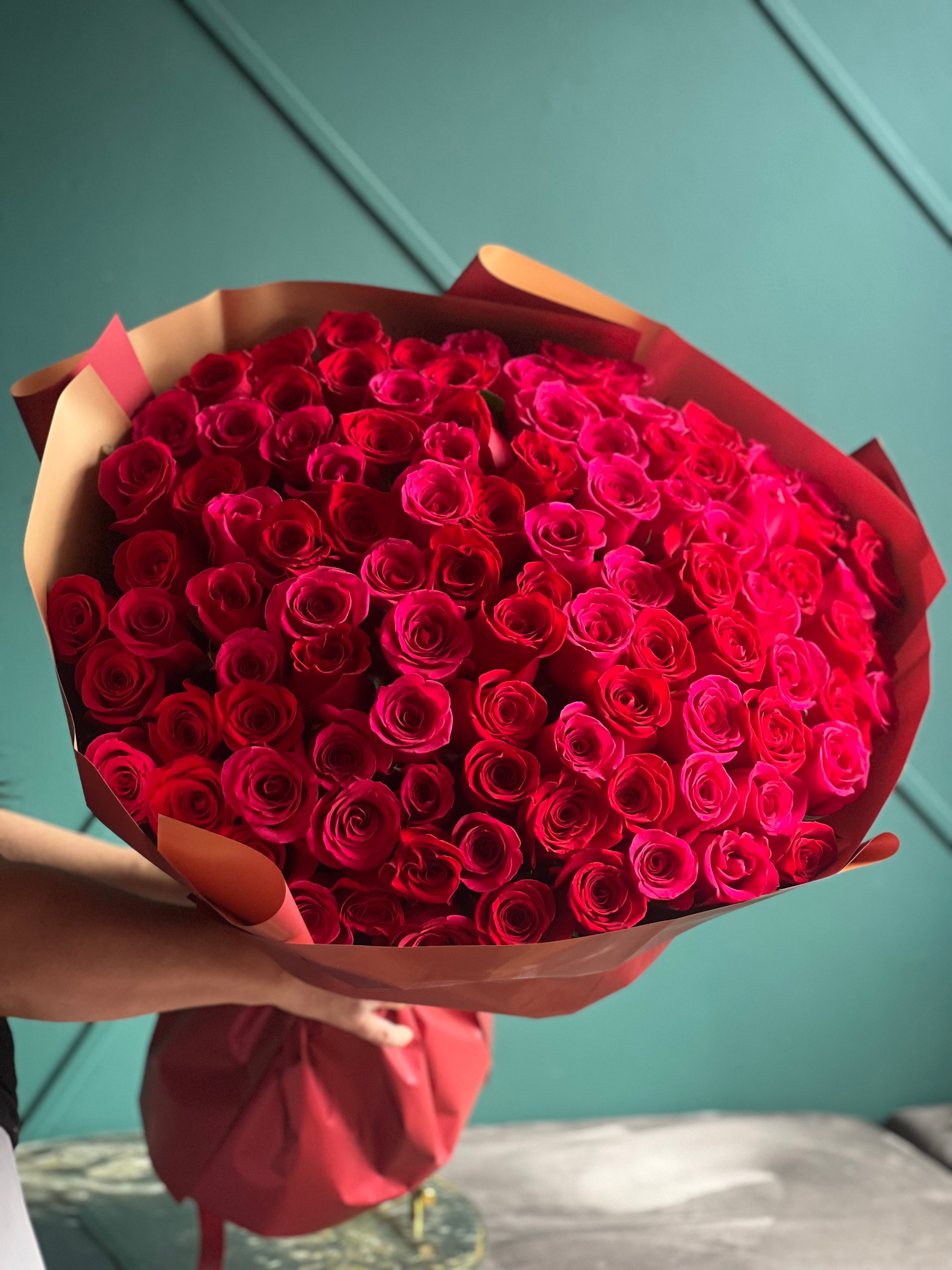 Hand-tied 100 roses bouquet with luxury wrapping