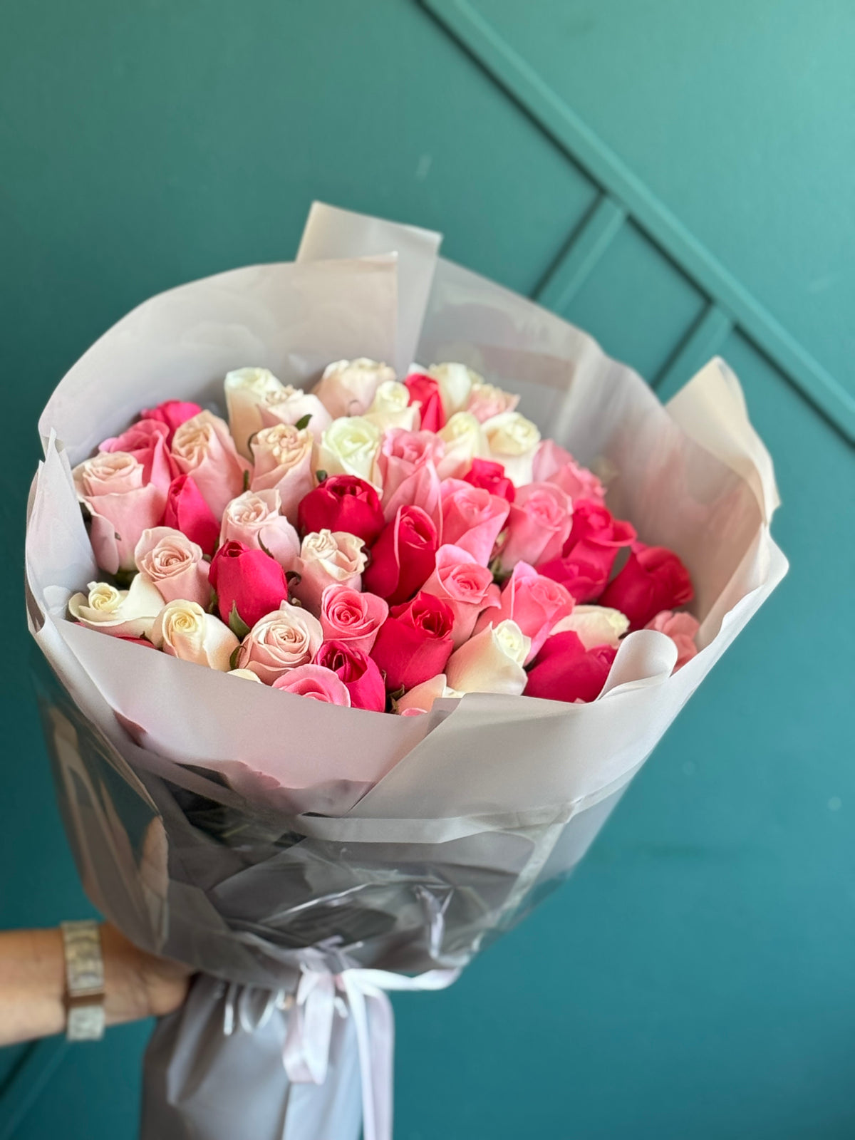 Hand-tied 50 pink roses bouquet by Luxury Flowers Miami