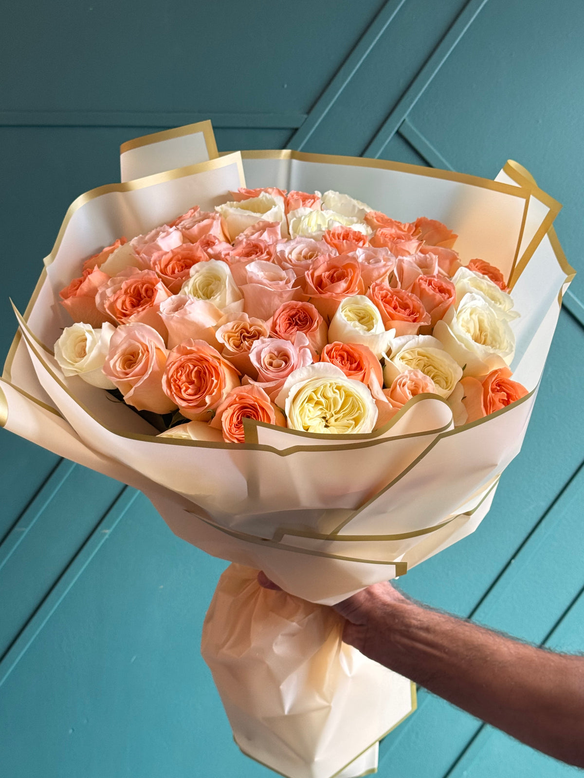 Hand-tied 50 roses bouquet by Luxury Flowers Miami