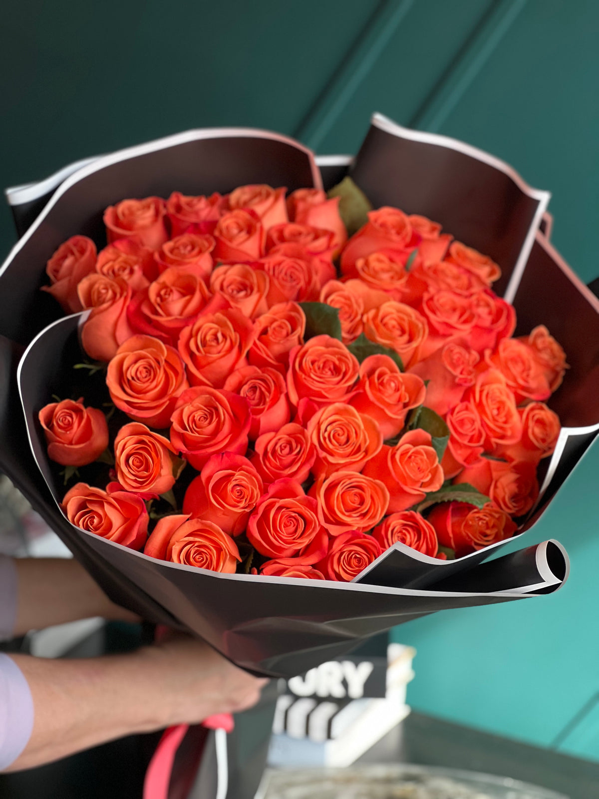 Handcrafted 50 orange roses bouquet in Miami Beach