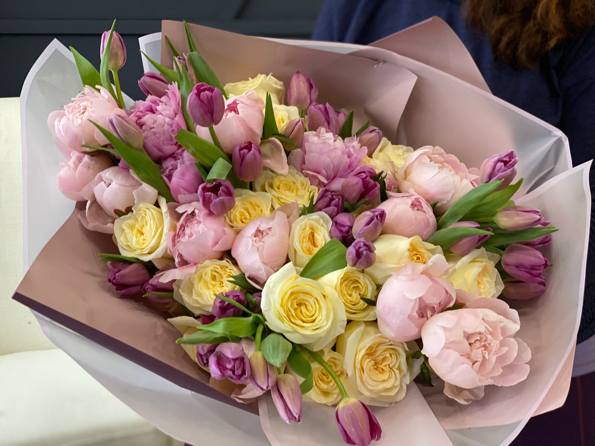 Handcrafted European floral bouquet in pink and cream tones
