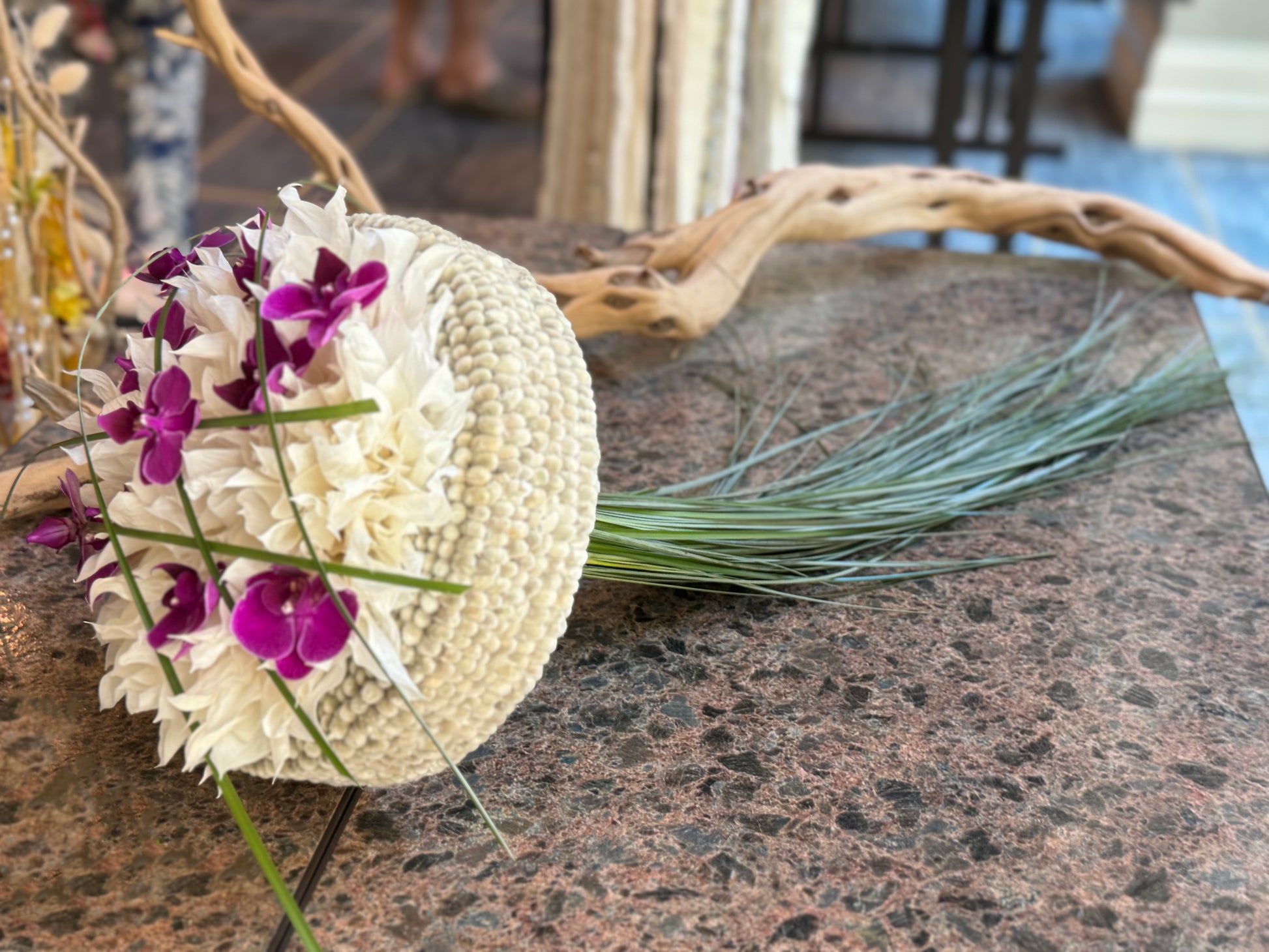Handcrafted bridal bouquet with fresh Phalaenopsis orchids