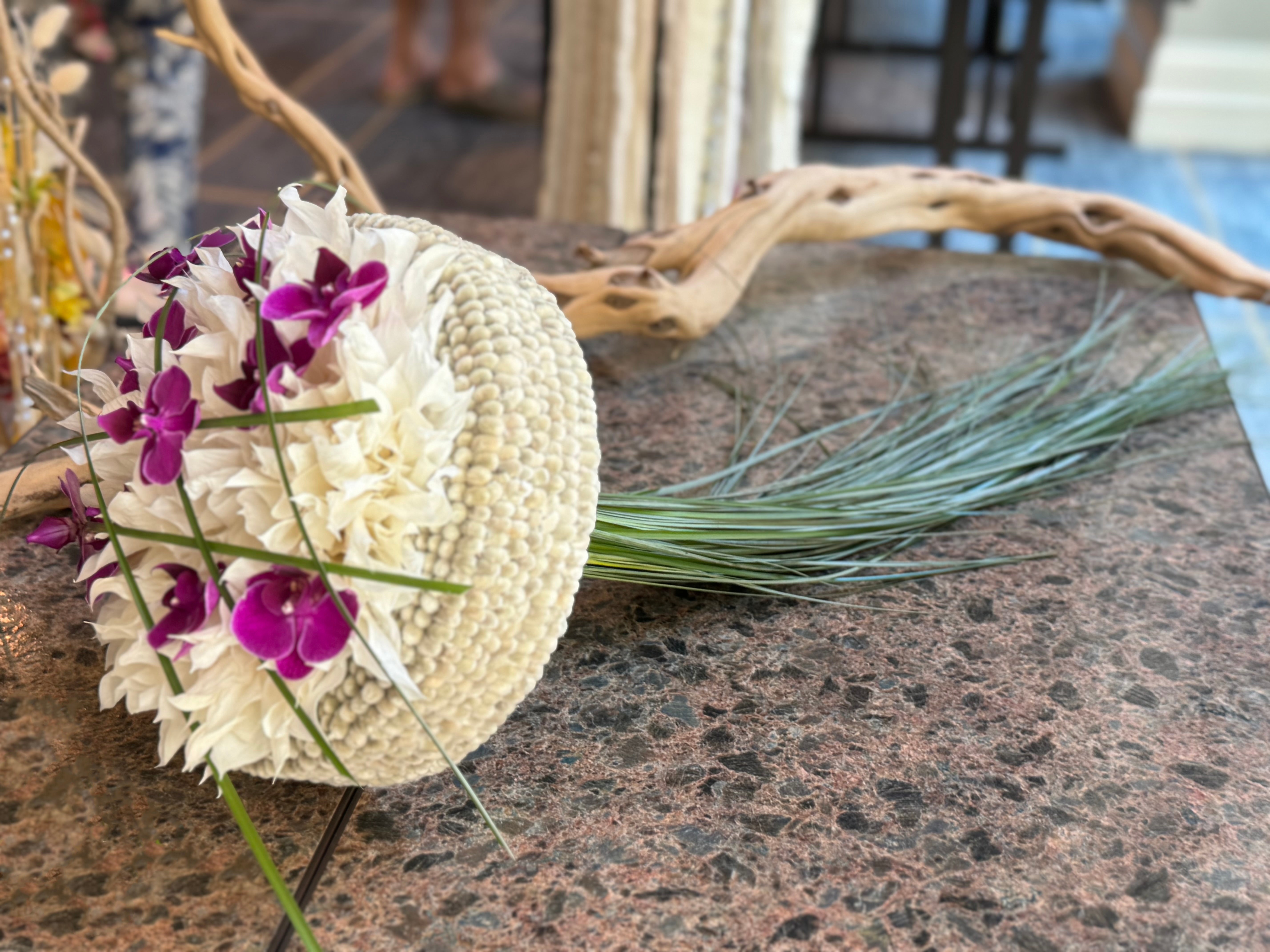 Handcrafted bridal bouquet with fresh Phalaenopsis orchids