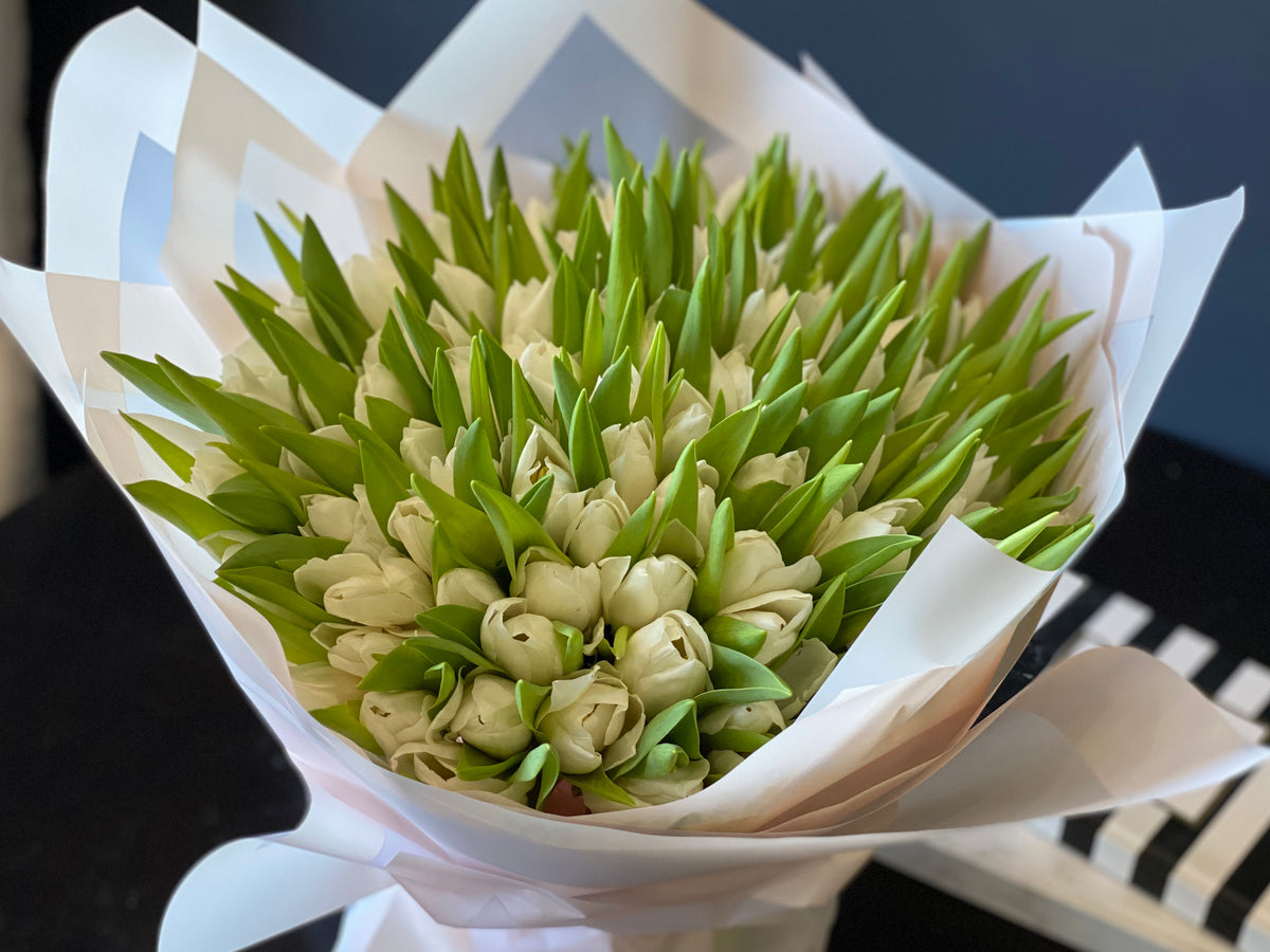 Handcrafted white tulip bouquet for anniversary in Miami