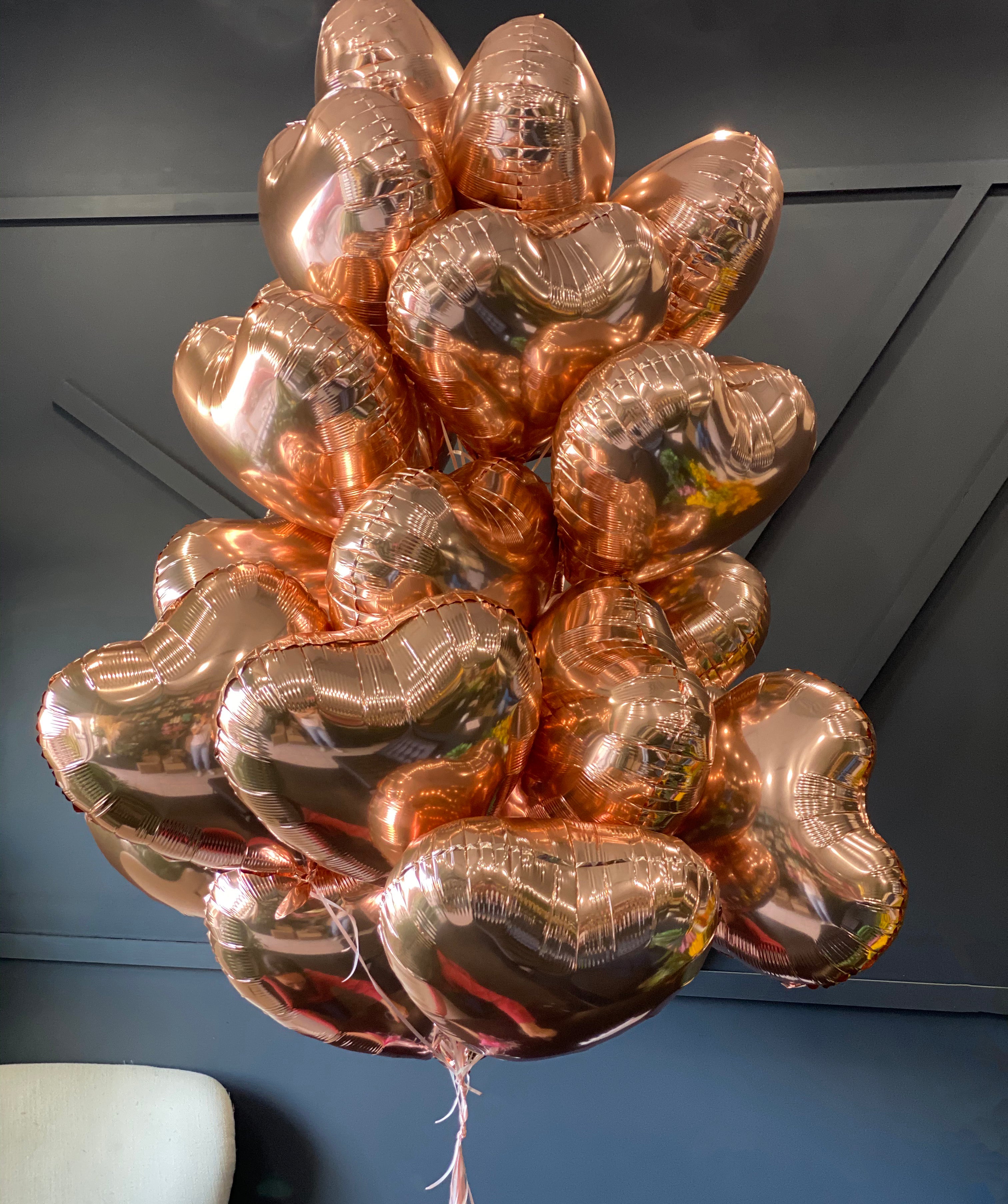 Heart-shaped rose gold balloons for party décor and gifting