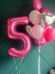 Hot pink number balloon bouquet with helium balloons Miami