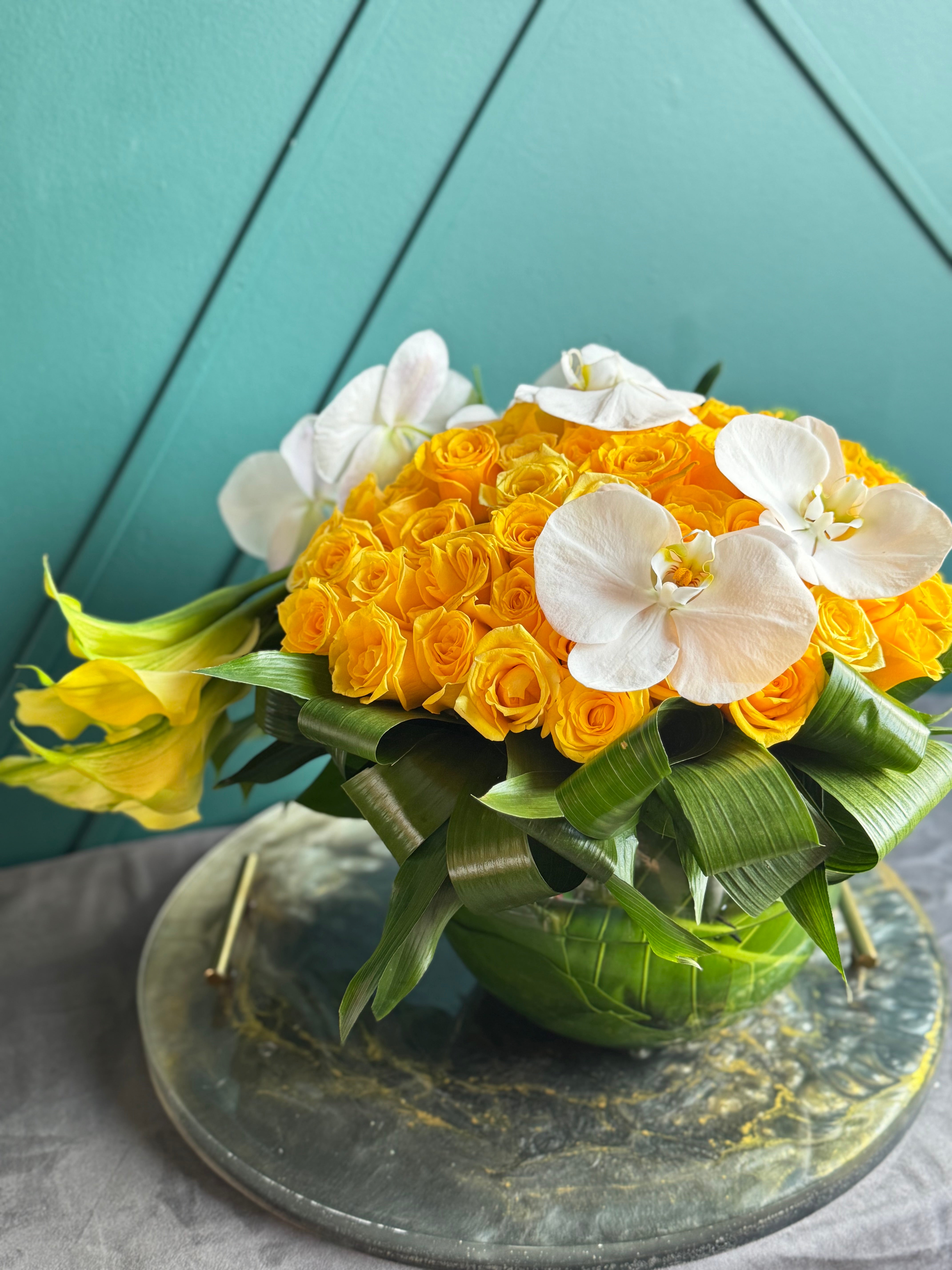 50 Yellow Roses with Orchids & Calla Lilies in Fishbowl Vase