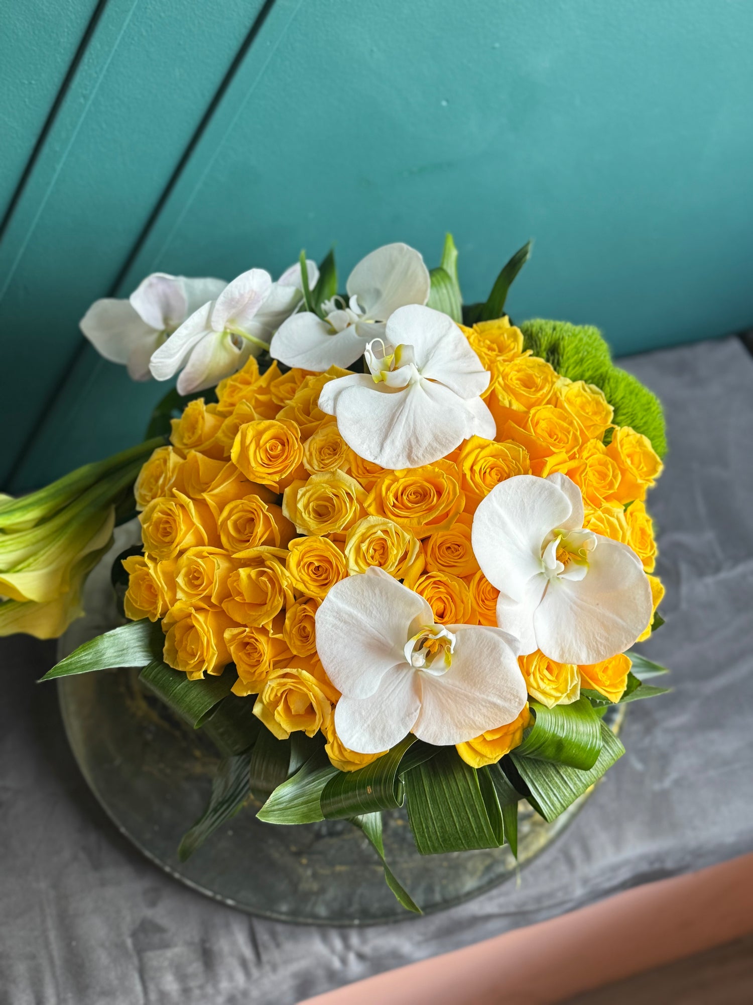 50 Yellow Roses with Orchids & Calla Lilies in Fishbowl Vase