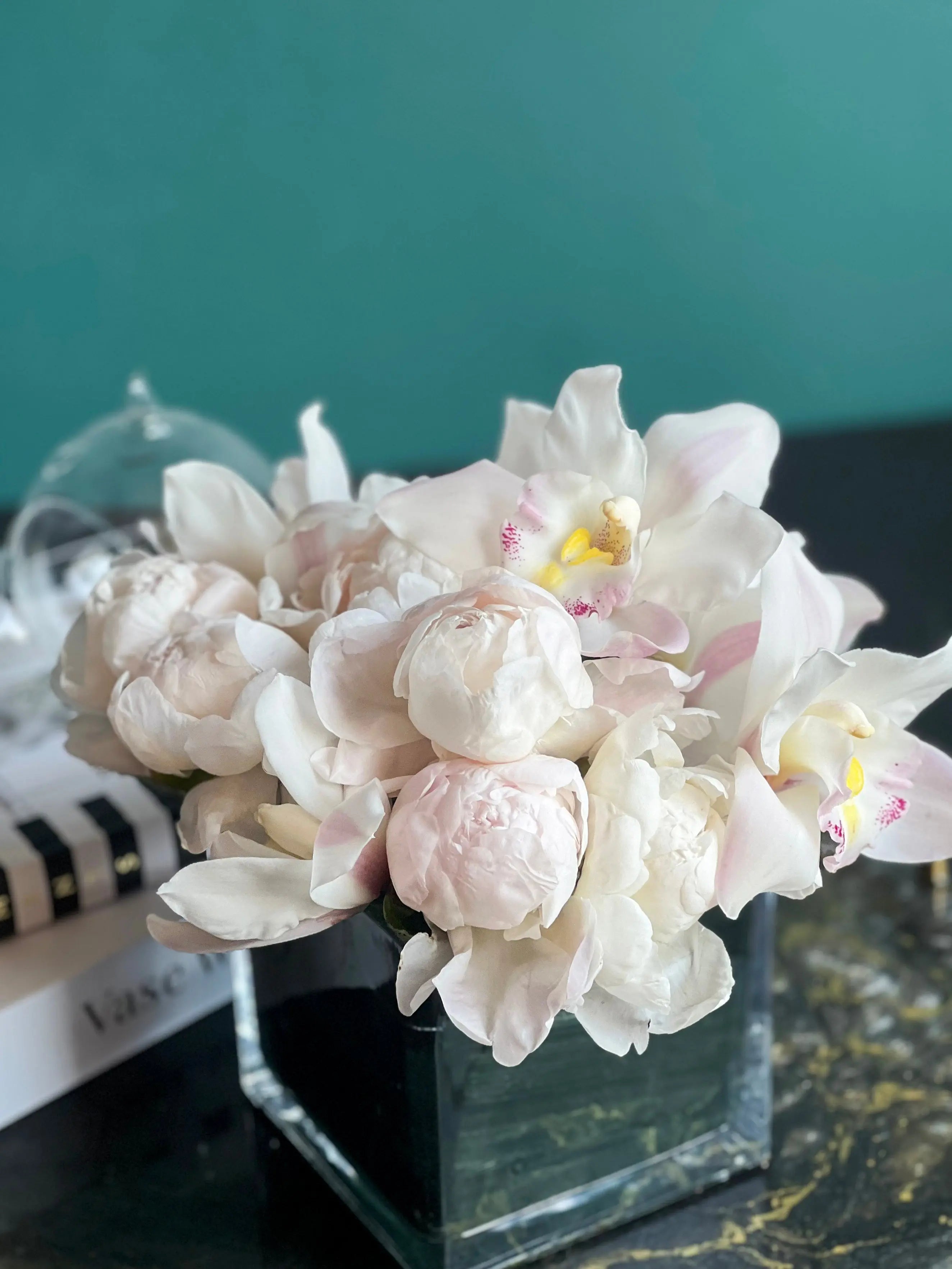 Peonies and Cymbidium Orchids in Cube Vase | Elegant Flower Design buy online Luxury Flowers Miami