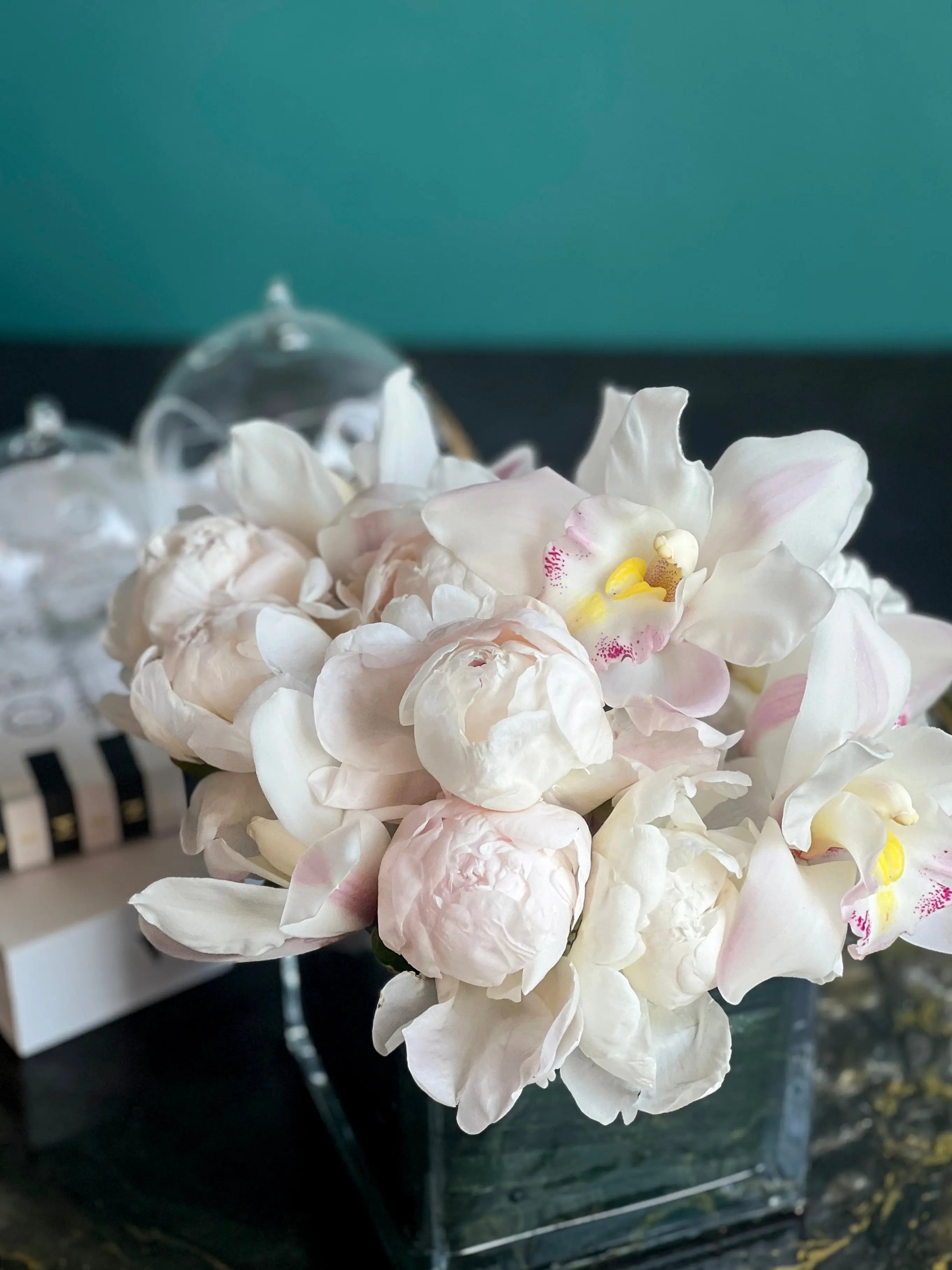 Peonies and Cymbidium Orchids in Cube Vase | Elegant Flower Design buy online Luxury Flowers Miami