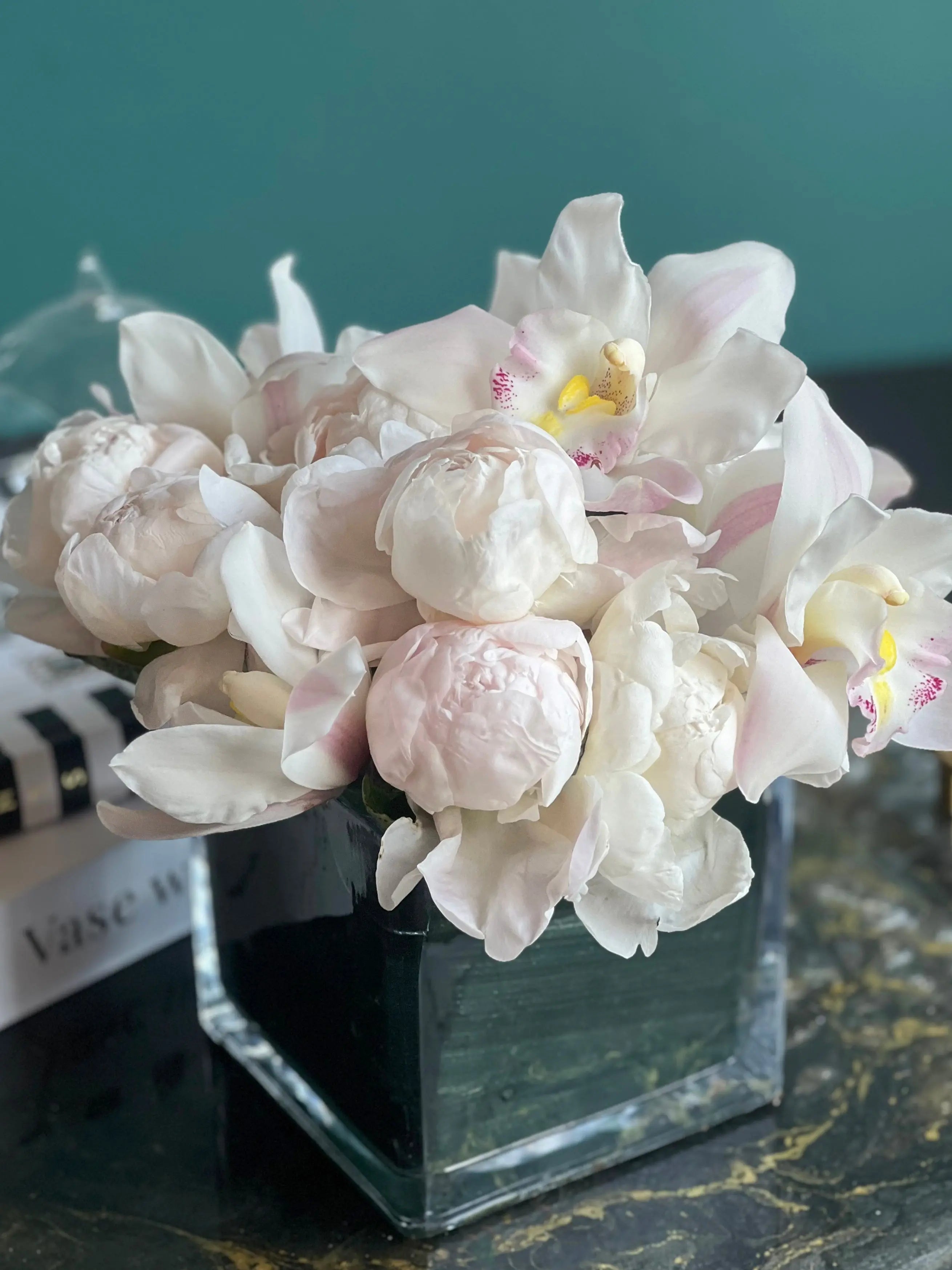 Peonies and Cymbidium Orchids in Cube Vase | Elegant Flower Design buy online Luxury Flowers Miami