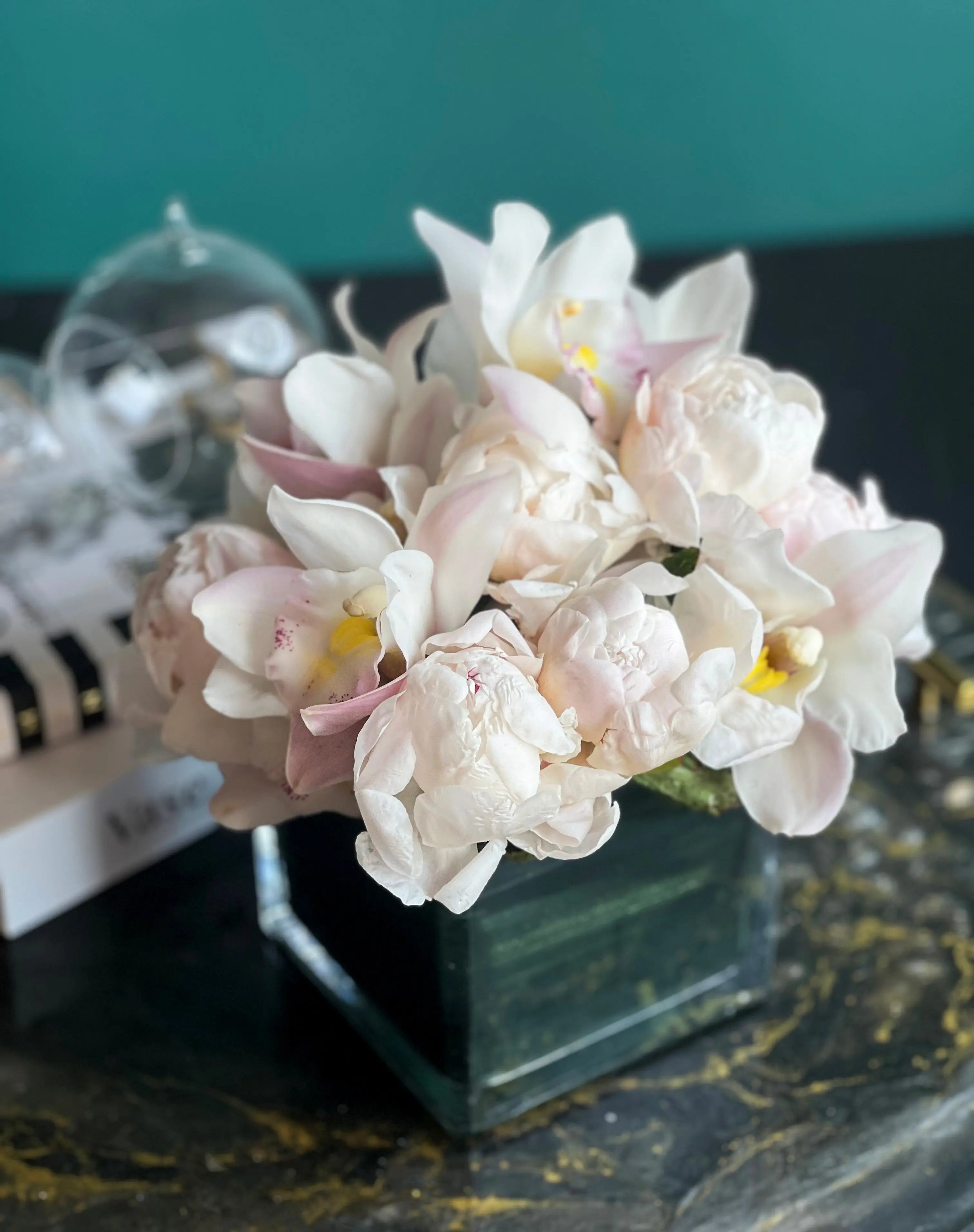 Peonies and Cymbidium Orchids in Cube Vase | Elegant Flower Design buy online Luxury Flowers Miami