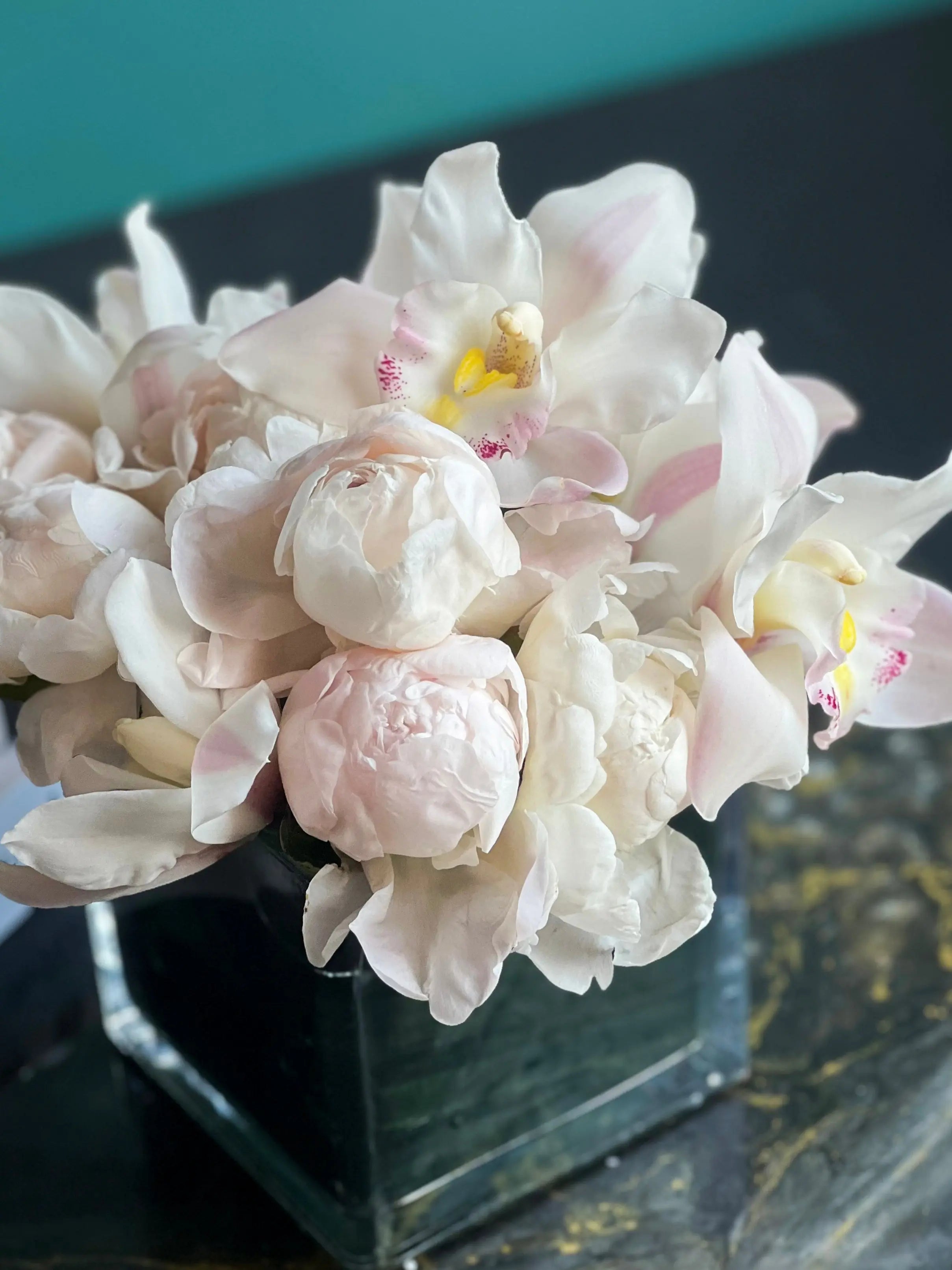 Peonies and Cymbidium Orchids in Cube Vase | Elegant Flower Design buy online Luxury Flowers Miami