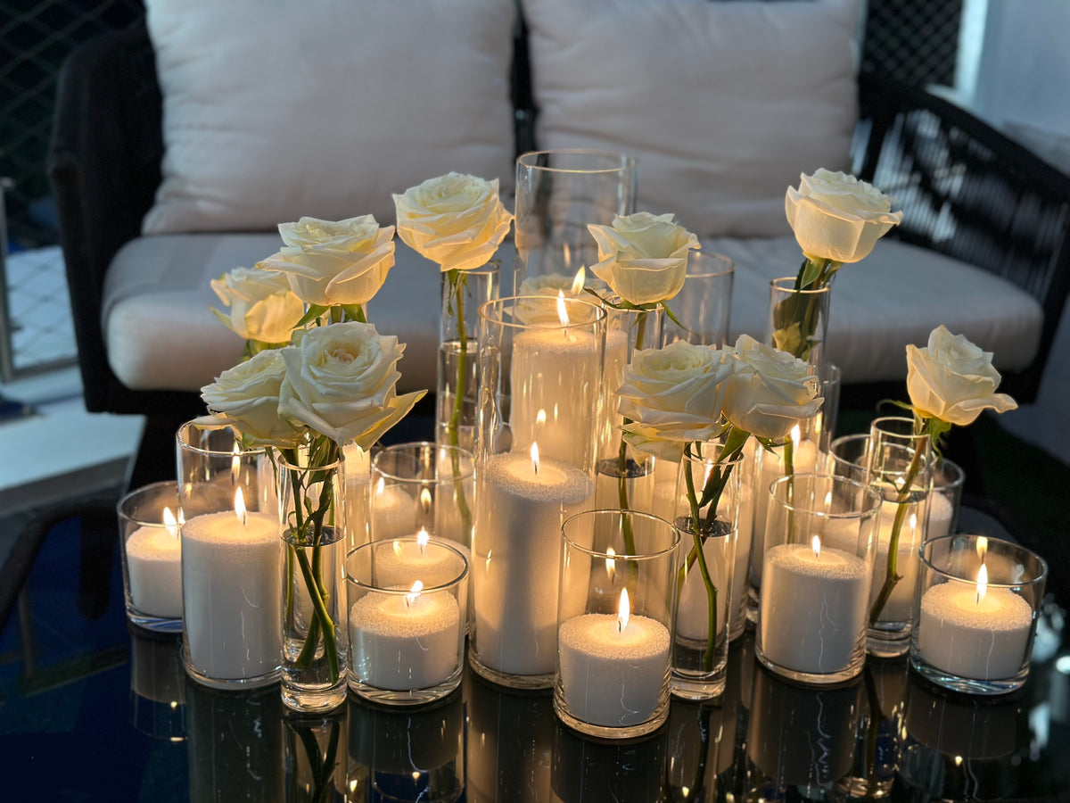 Luxury candle proposal decor in Miami with flowers and romantic lighting