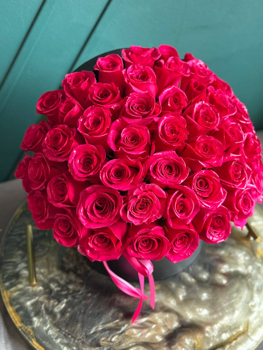 50 Hot Pink roses in a box