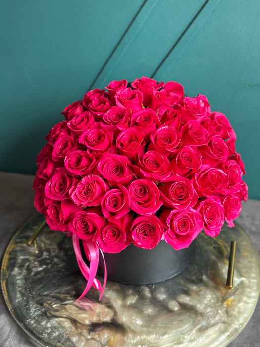 50 Hot Pink roses in a box
