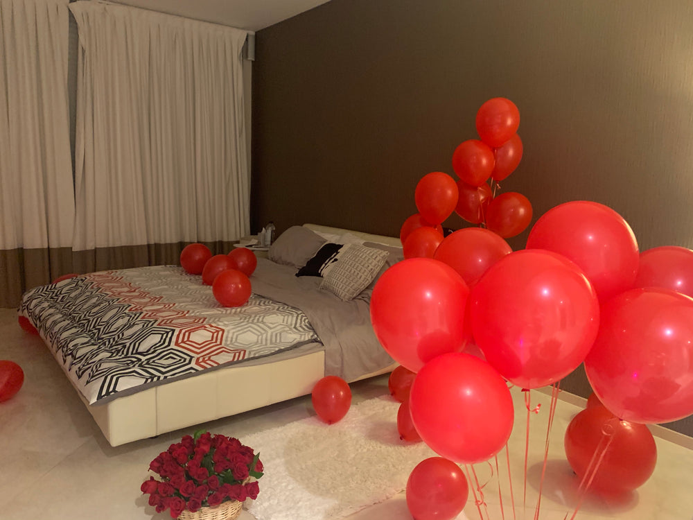 Private residence proposal setup in Miami with roses, candles and romantic decor