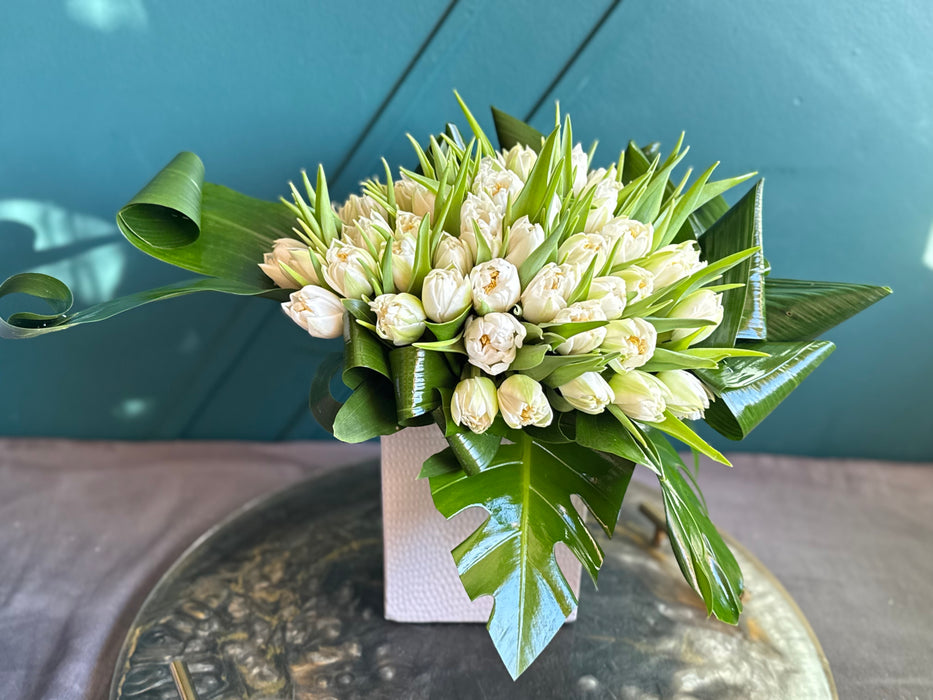 50 White Tulips In ceramic vase