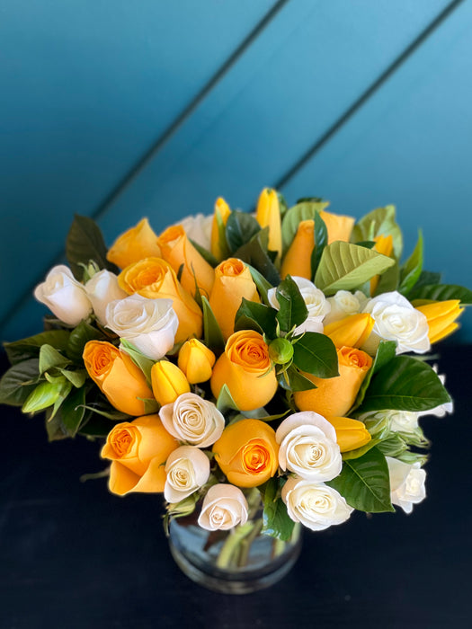 Bright mixed flower arrangement in a vase